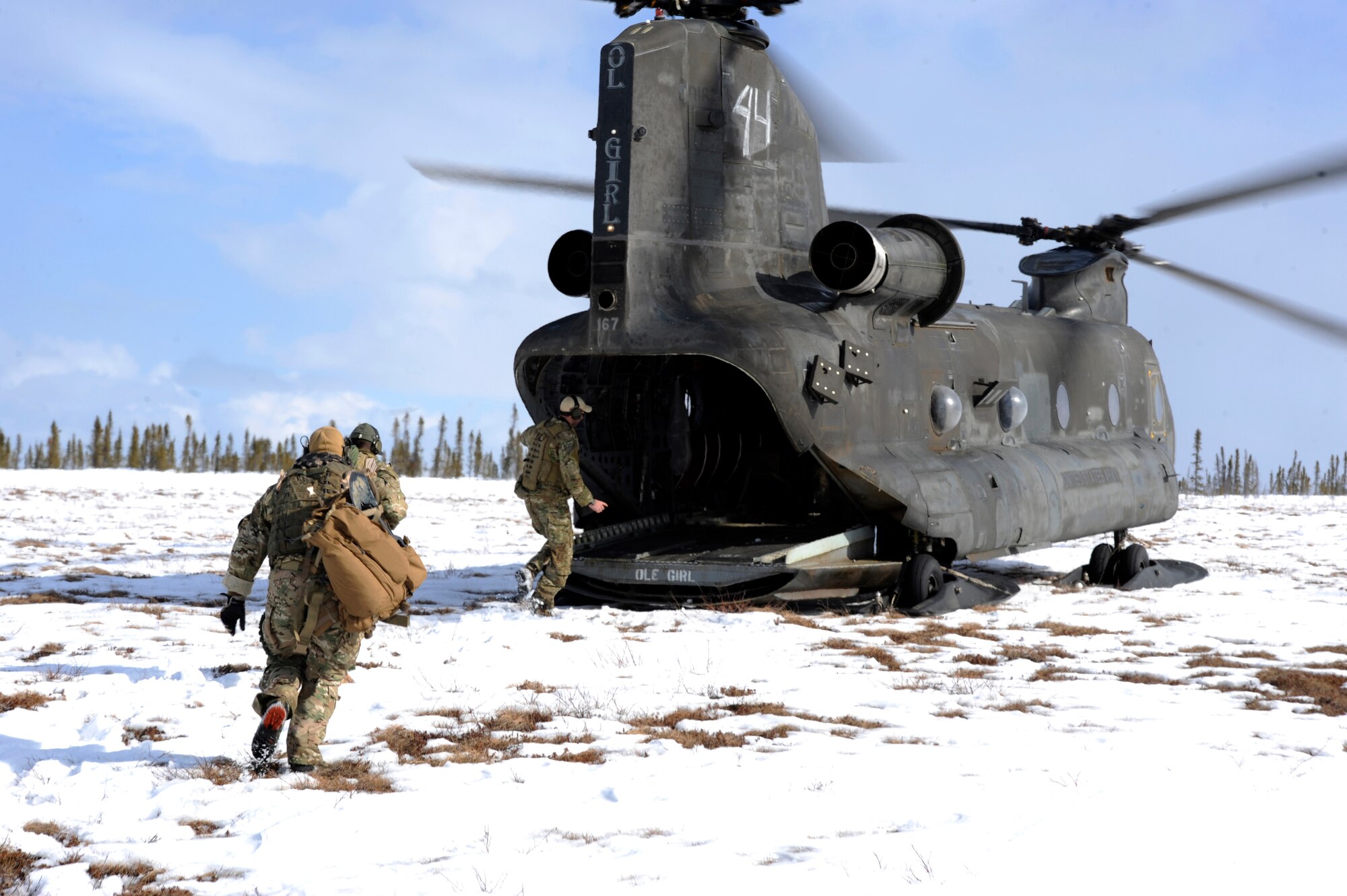 Special operations weather team operators tactically board a CH-47 Chinook during a training operation for Red Flag-Alaska 10-2 April 15, 2010, Eielson Air Force Base, Alaska. The training simulates operations down range, where weather pods are dropped around the Joint Pacific Alaska range complex. (U.S. Air Force photo/Airman 1st Class Willard E. Grande II)