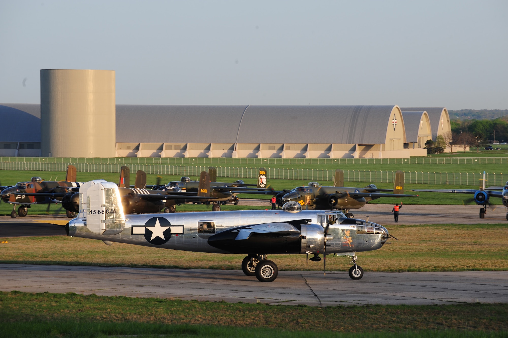 Vintage B-25 Mitchell aircraft arrive at the National Museum of the U.S. Air Force at Wright Patterson Air Force Base, Ohio, to take part in events honoring the 68th Doolittle Raiders' reunion, April 17, 2010. The event commemorates the anniversary of the Doolittle Tokyo Raid when on April 18, 1942, U.S. Army Air Forces Lt. Col. Jimmy Doolittle's squad of 16 B-25s bombed targets in response to the Japanese attack on Pearl Harbor. (U.S. Air Force photo/Tech. Sgt. Jacob N. Bailey)
