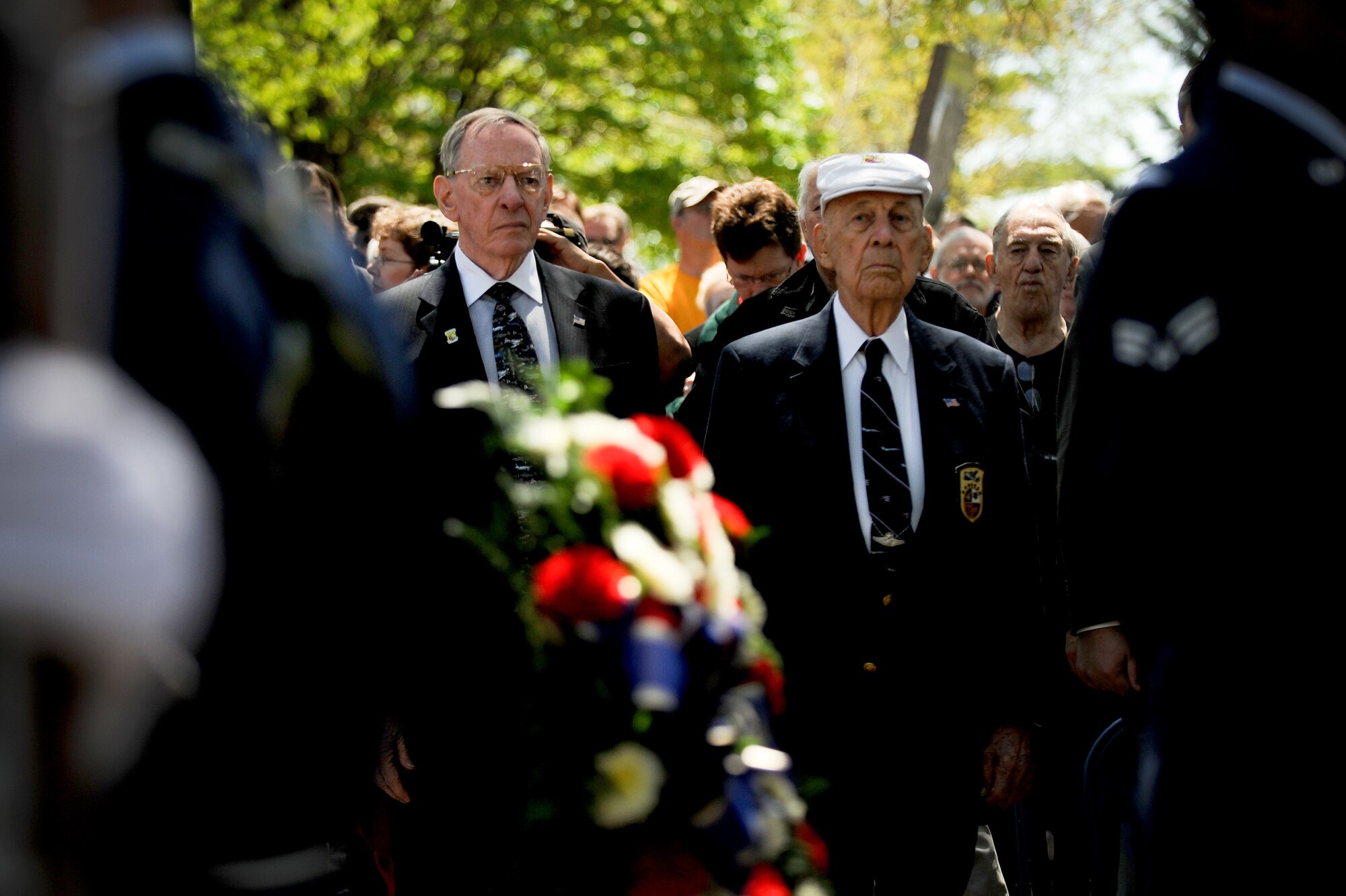Maj. Gen. (ret.) Charles D. Metcalf, director of the National Museum of the United States Air Force, and Lt. Col (Ret.) Richard E. Cole, co-pilot of the first B-25 Mitchell Bomber that took part in the Doolittle Tokyo Raid, stand during the opening flag ceremony at a memorial service held in honor of the Doolittle Tokyo Raiders during their 68th reunion held at the National Museum of the United States Air Force, Wright-Patterson Air Force Base, Ohio, April 18th, 2010. The Doolittle Raiders' 68th reunion commemorates the anniversary of the Doolittle Tokyo Raid on April 18th, 1942, when U.S. Army Air Forces Lt. Col. Jimmy Doolittle's squad of 16 B-25s bombed targets in response to the Japanese attack on Pearl Harbor. (U.S. Air Force photo/Master Sgt. William Greer) 
