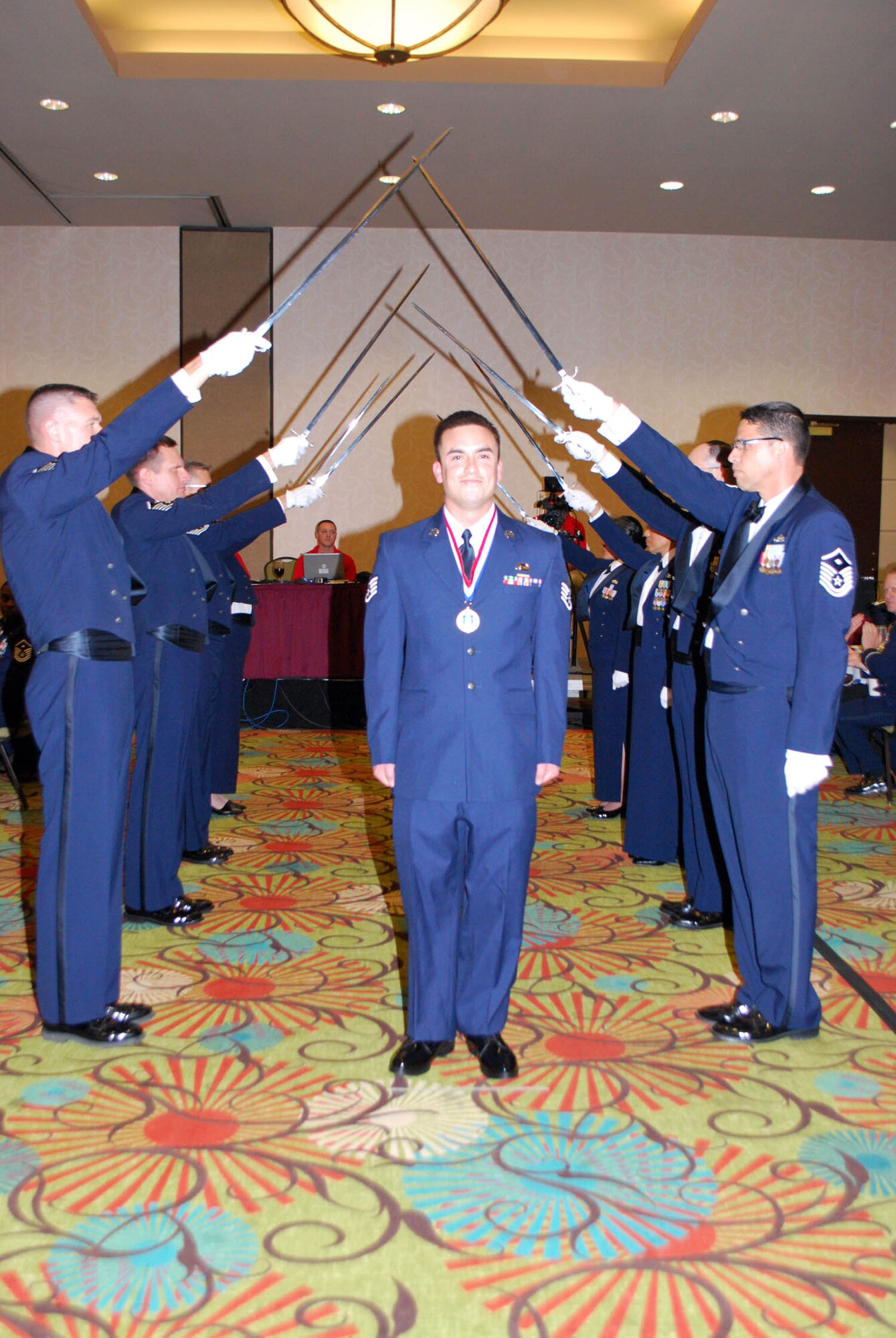 Staff Sgt. McKeown is introduced at the Outstanding Airmen of the Year award ceremony at Robins Air Force Base, Ga., on Apr. 14. (U.S. Air Force photo/Staff Sgt. Celena Wilson, Air Force Reserve Command public affairs)
