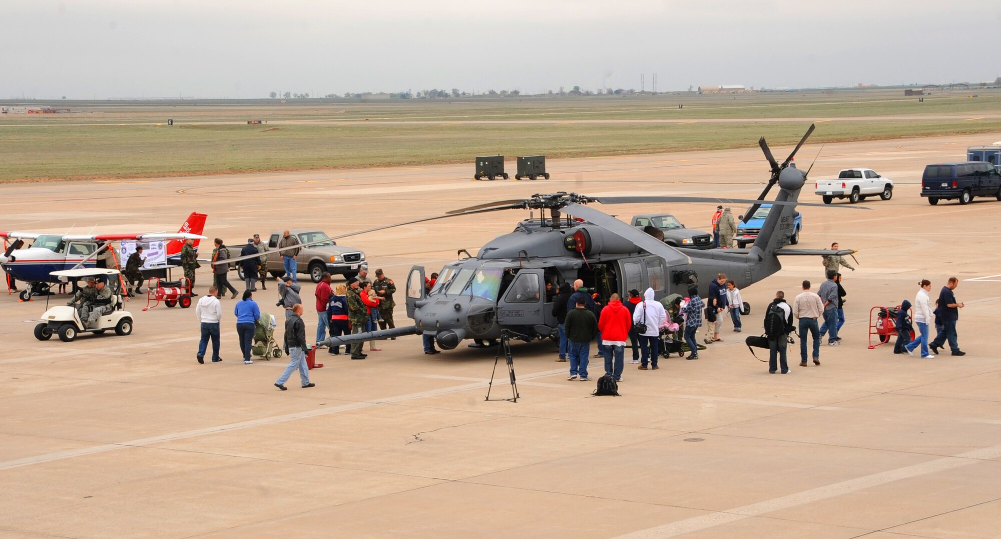 The 27th Special Operations Wing held its inaugural Open House April 17 on the Cannon Air Force Base, N.M. flightline. People from New Mexico and Texas  came out for the free viewing of several aircrafts such as the HH-60 Pave Hawk. (U.S. Air Force photo by Airman 1st Class Maynelinne De La Cruz)