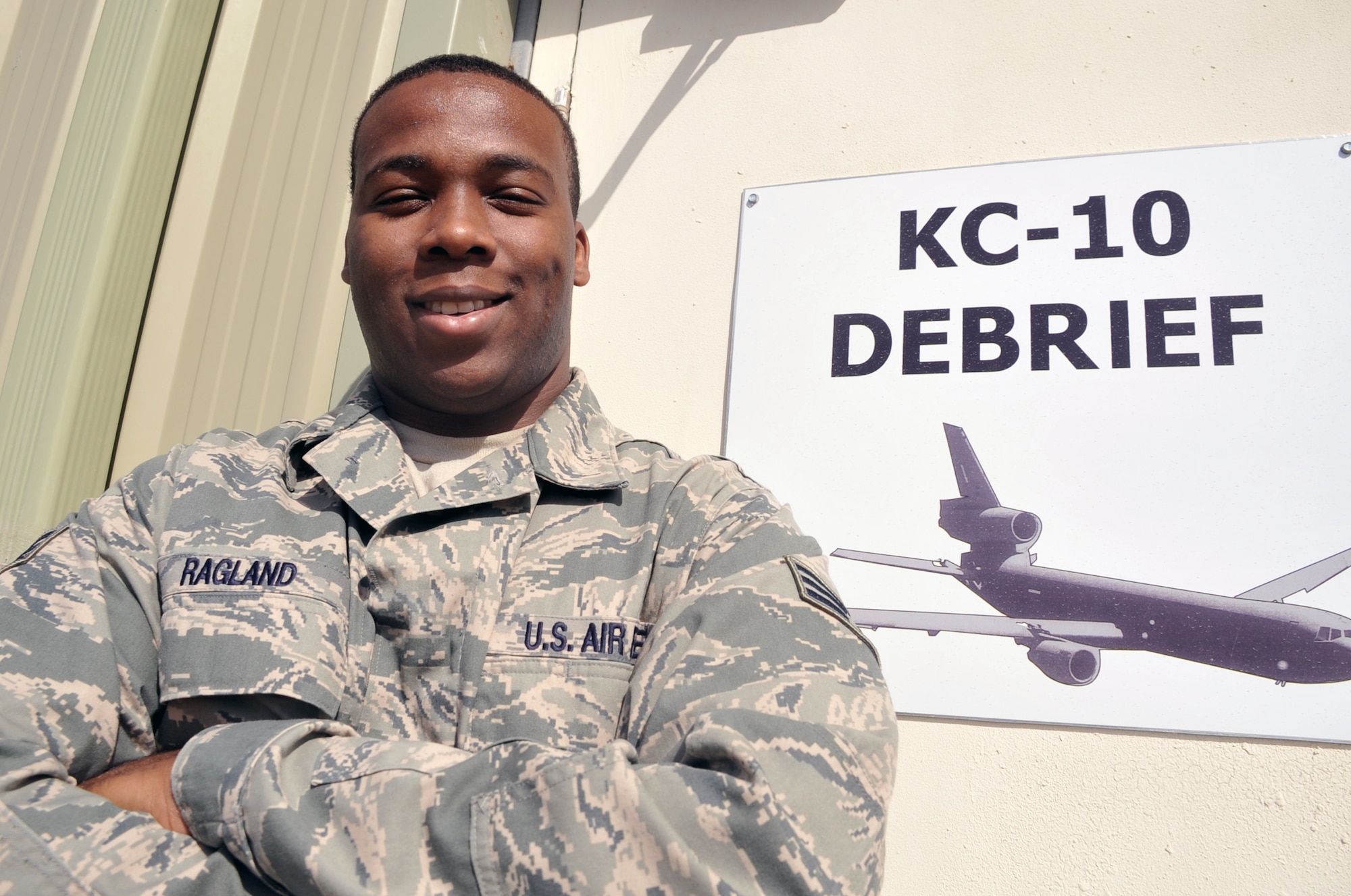 Senior Airman Alex Ragland is a communications and navigations journeyman with the 380th Expeditionary Aircraft Maintenance Squadron who works as an aircraft maintenance debriefer on the KC-10 Extender airframe. Here he is pictured April 20, 2010.  Airman Ragland is deployed from the 305th Aircraft Maintenance Squadron at Joint Base McGuire-Dix-Lakehurst, N.J., and his hometown is Gadsden, Ala. (U.S. Air Force Photo/Master Sgt. Scott T. Sturkol/Released)