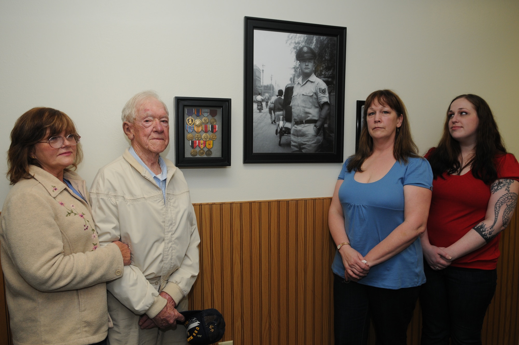 GOODFELLOW AIR FORCE BASE, Texas -- The family of Tech. Sgt. Fred Sebers stands next to his memorial display, April 15, 2010. Sergeant Sebers was killed in 1967 while assigned to Det. 1, 6994th Security Squadron, Nha Trang, Republic of Vietnam. His family visited Goodfellow to see the building dedicated to his memory. (U.S. Air Force photo/Airman 1st Class Clayton Lenhardt)