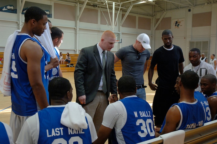 The 437th Maintenance Squadron huddles together during a time out in the middle of the intramural basketball championship game held at the Fitness and Sports Center April 16, 2010, at Joint Base Charleston, S.C. After defeat in the championship game, the team finished the season with a 12-2 record. (U.S. Air Force photo/Staff Sgt. Marie Brown)
