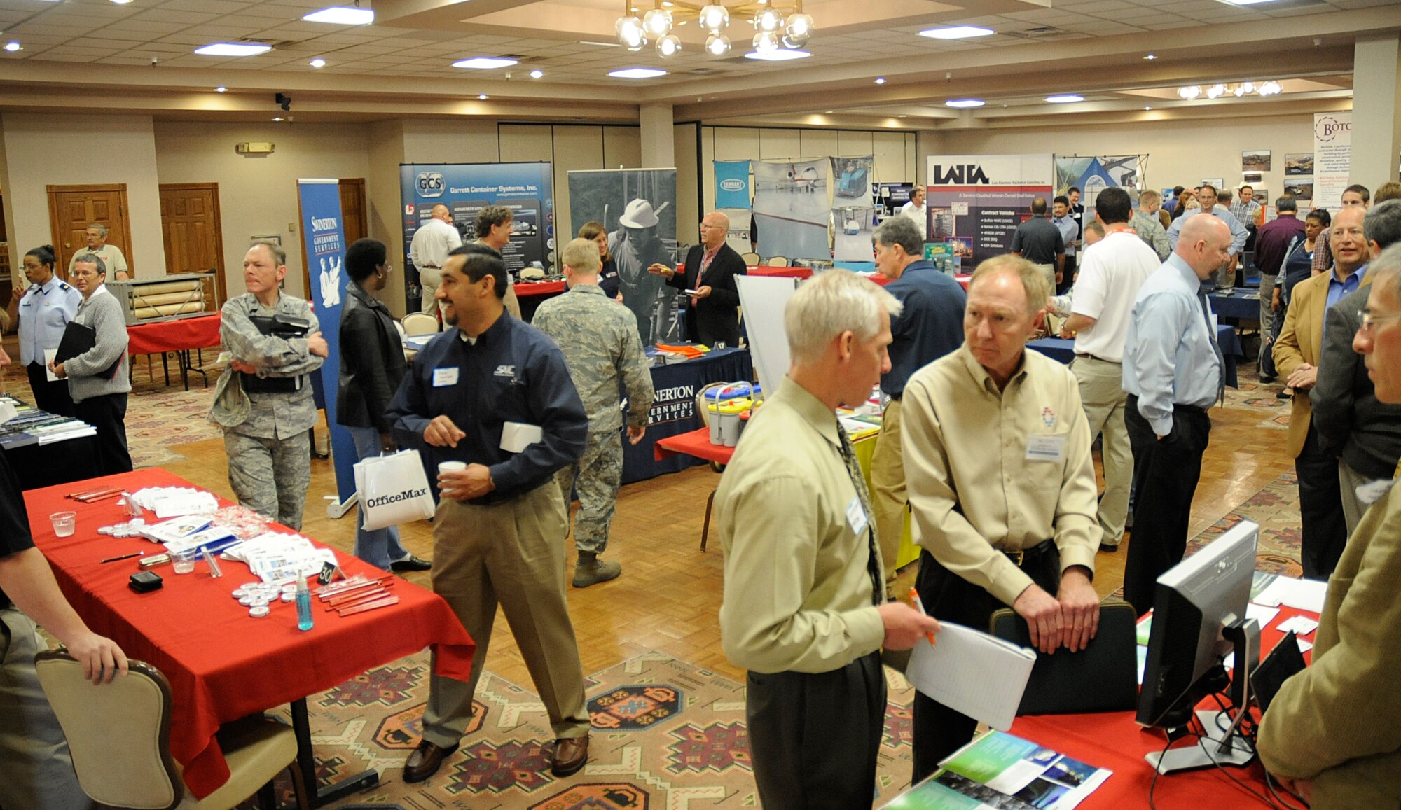 A crowd of industry and military gathers at The Landing Zone during Industry Day, April 16.  Cannon Air Force Base hosted its first event of this type to facilitate the exchange information on current and future base requirements with businesses and customer education for both internal military customers and contractors. (U.S. Air Force Photo by Senior Airman Evelyn Chavez)