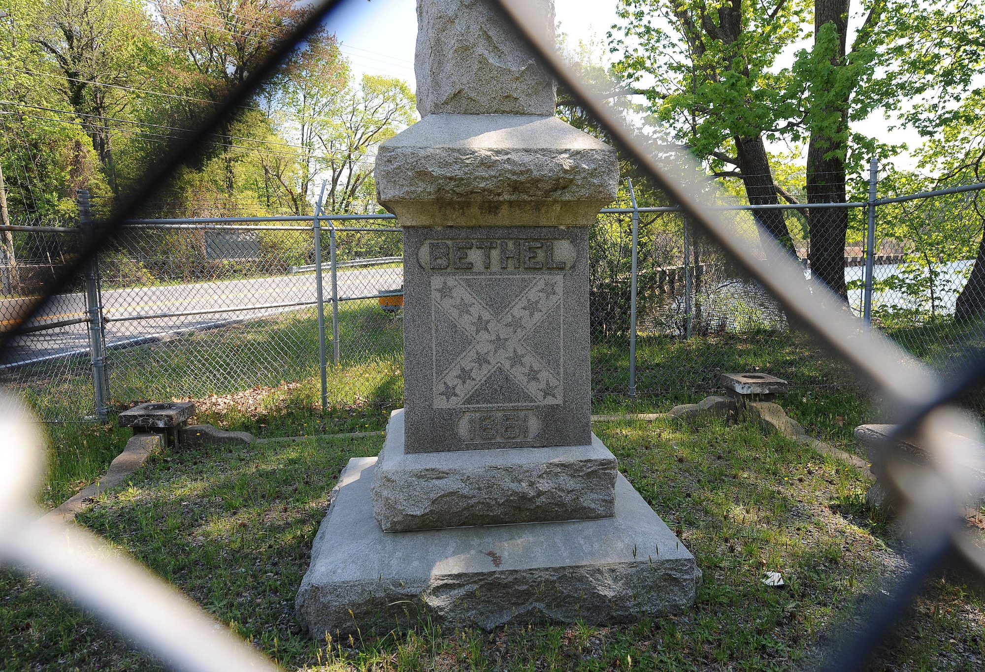 LANGLEY AIR FORCE BASE, Va. -- An obelisk commemorating the 100-year anniversary of the Battle of Big Bethel is shown through the fence at the Big Bethel Cemetery April 15. The obelisk was donated by the United Daughters of the Confederacy in 1961 in remembrance of the lives lost during the battle, which occurred at the site of the Big Bethel reservoir. (U.S. Air Force photo/Airman Rebecca Montez)