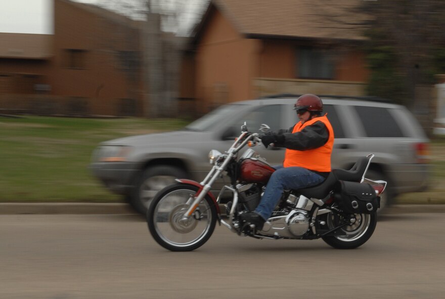 MINOT, N.D. -- Rod Krause, 5th Bomb Wing ground safety manger, heads into town for a ride on his motorcycle here April 18.  After proper inspection of his motorcycle and use of his personal protective equipment, Krause can enjoy a ride around town safely. (U.S. Air Force photo by Senior Airman Michael J. Veloz)