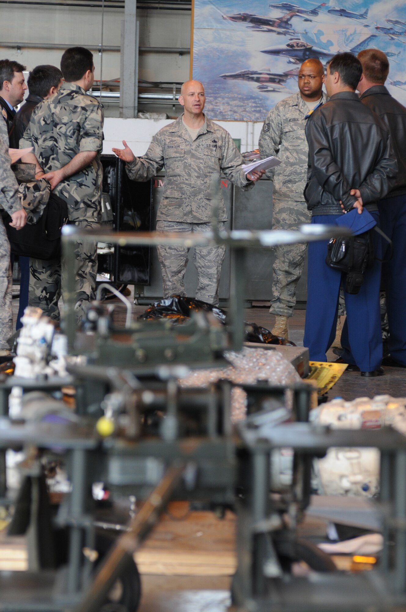 Master Sgt. David Trantham, 31st Maintenance Squadron section chief, briefs members of the Bulgarian and Romanian air forces on the phase inspection process and explains the repair procedures April 14. The main focus of the visit was to educate the Bulgarian and Romanian air forces on how the 31st Maintenance Group trains and develops Airmen from the lowest rank to senior noncommissioned officer level. (U.S. Air Force photo/Staff Sgt. Nadine Y. Barclay)