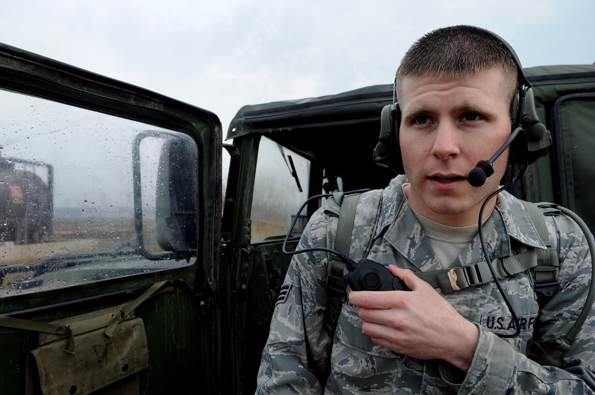 U.S. Air Force Senior Airman Joseph Rimmacher, 435th Air Mobility Squadron crew chief, performs a function check on a radio unit, Ramstein Air Base, Germany, April 14, 2010. Airman Rimmacher won the 2009 Lt. Gen. Leo Marquez Award for demonstrating the highest degree of sustained job performance, job knowledge, and job efficiency. (U.S. Air Force photo by Airman 1st Class Grovert Fuentes-Contreras)