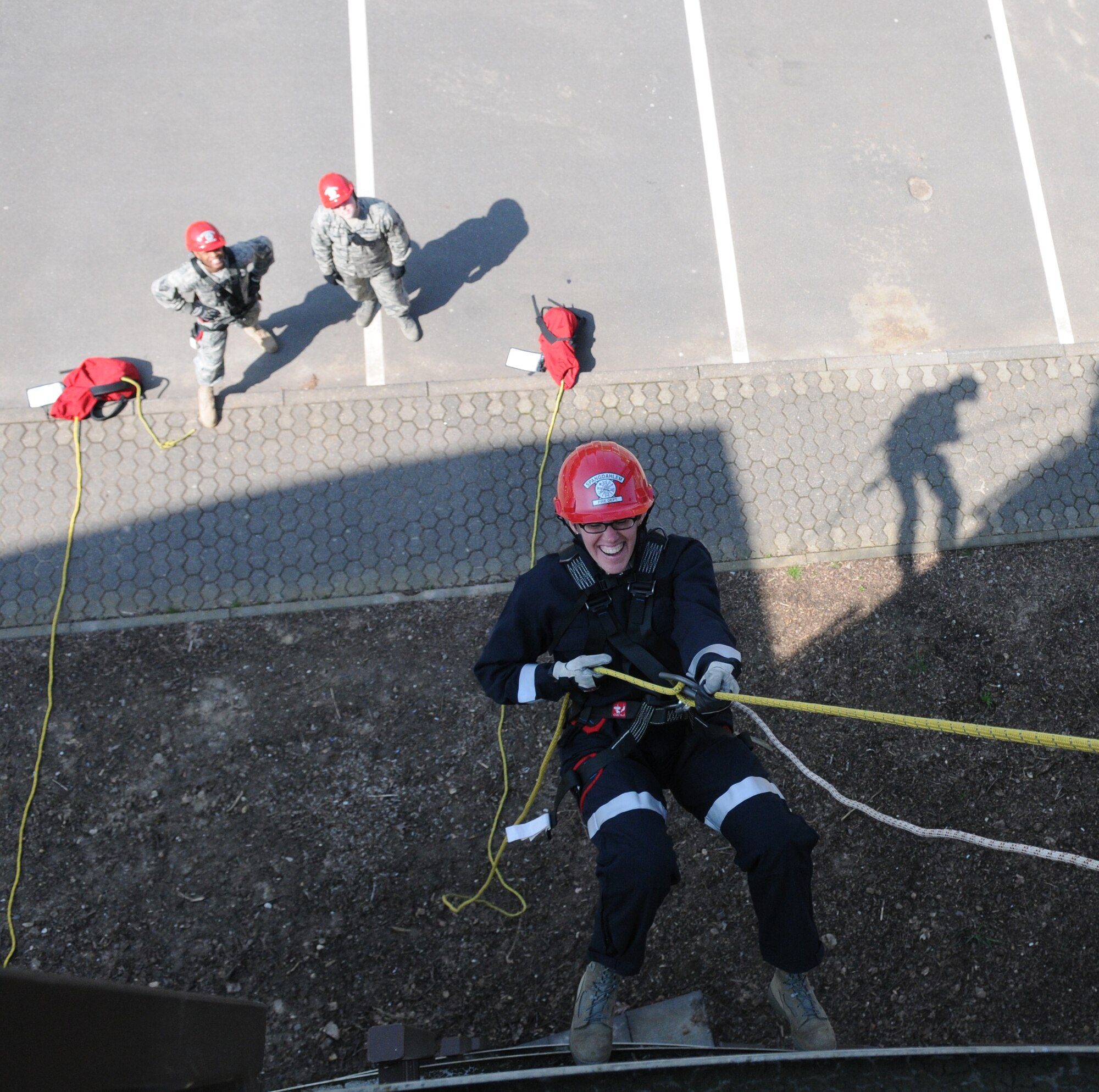 SPANGDAHLEM AIR BASE, Germany – Col. Jodine Tooke, 52nd Mission Support Group commander, participates in a repelling exercise April 16. The 52nd Civil Engineer Squadron firefighters led Colonel Tooke through numerous firefighting exercises to provide first-hand experience. (U.S. Air Force photo/Airman 1st Class Staci Miller)