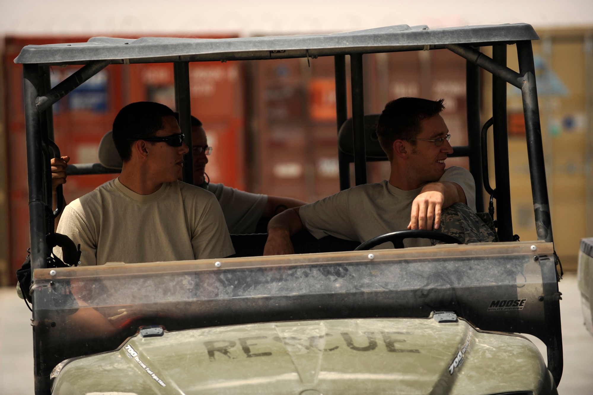 Left to right, Senior Airman Eddie Navarro, an HH-60G Pave Hawk communications and navigations systems specialist, Staff Sgt. Spencer Paul, an HH-60G electronics specialist and Staff Sgt. Christopher Spell, an HH-60G electronic counter measures specialist, all assigned to the 451st Expeditionary Aircraft Maintenance Squadron helicopter maintenance unit, converse while on stand-by for their next alert call, April, 16, 2010, Camp Bastion, Afghanistan. (U.S. Air Force photo/Staff Sgt. Manuel J. Martinez,released)


