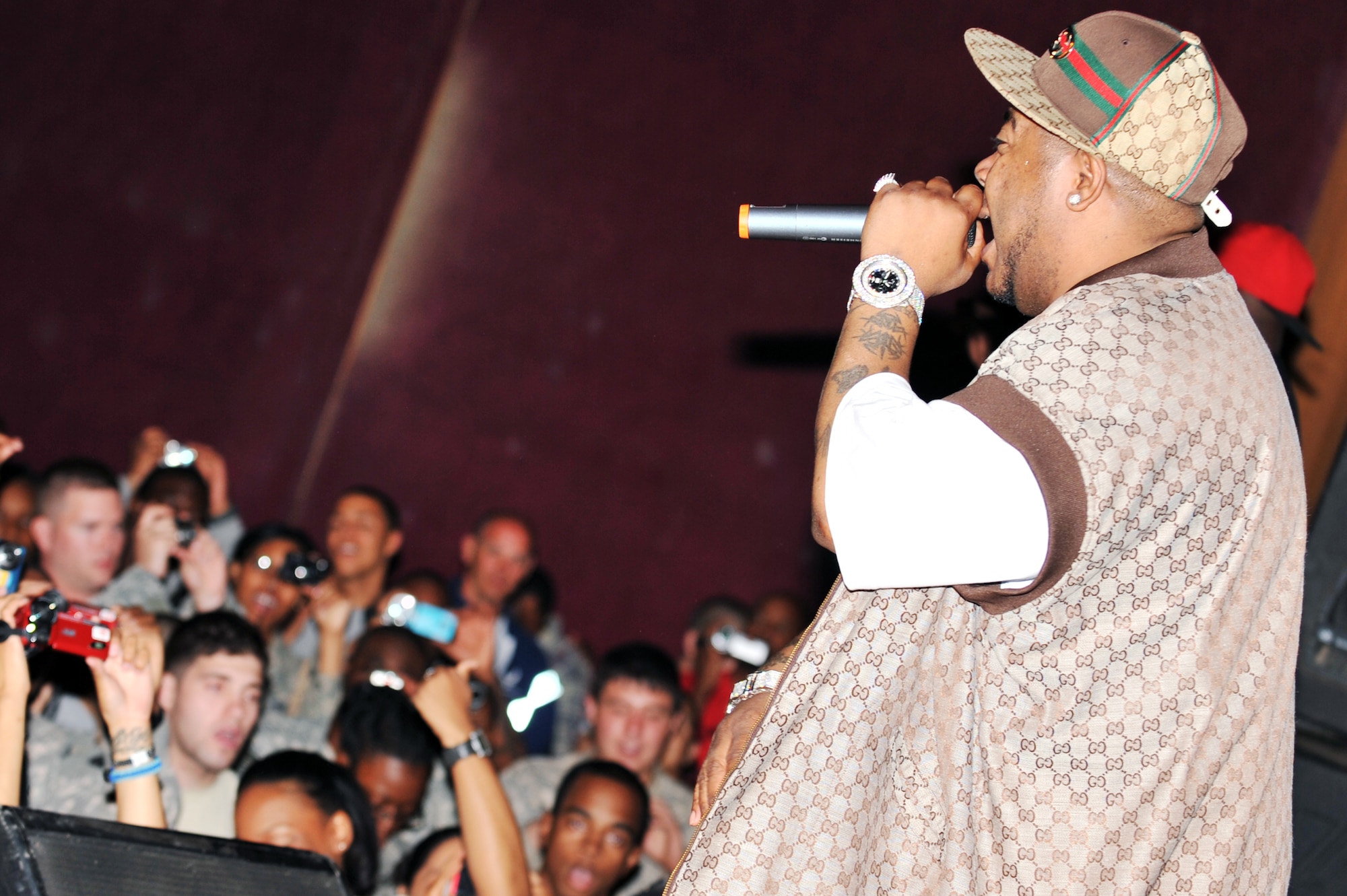 Twista performs for more than 600 deployed servicemembers and contractors at Joint Base Balad, Iraq, April 15, 2010. After the concert, audience members lined up for a meet-and-greet and autograph session with the artist. (U.S. Air Force photo/Senior Airman Brittany Y. Bateman/Released)