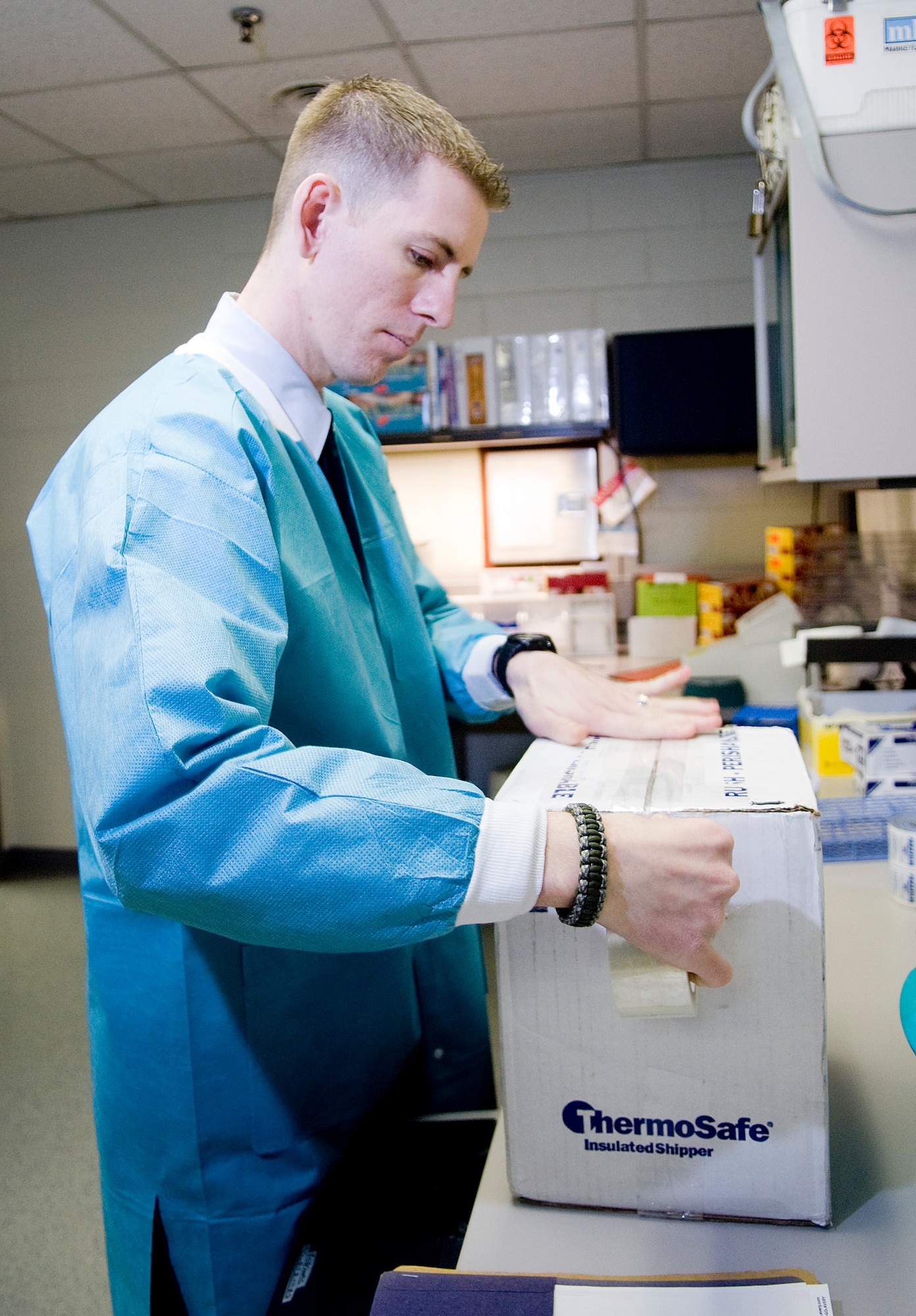 KUNSAN AIR BASE, Republic of Korea -- Senior Airman Jon Ringenoldus, a laboratory technician from the 8th Medical Support Squadron, packs up chemistry to be sent out for testing. National Medical Laboratory Professional Week is April 18-24 and is a week of recognizing the contributions of what the laboratory technicians provide to medical health care. (U.S. Air Force photo/Senior Airman Jonathan Steffen)