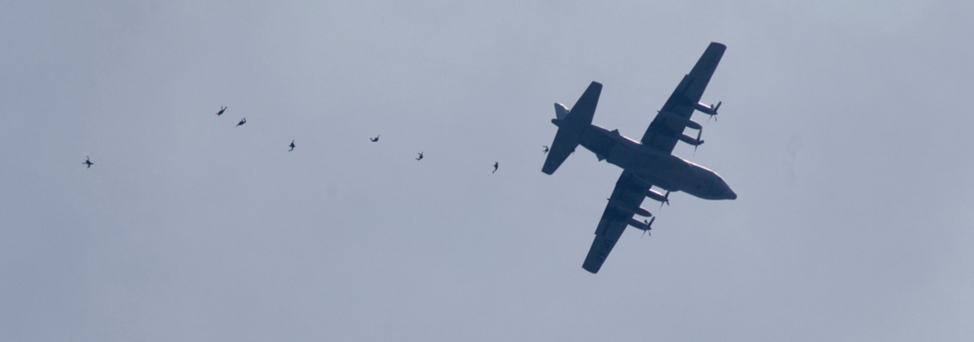 Indonesian soldiers and airmen jump from a C-130 Hercules from Yokota Air Base, Japan, on April 21, 2010, during Cope West 10 at Halim Air Base, Indonesia.  Cope West is a Pacific Air Forces-sponsored bilateral tactical airlift exercise involving the U.S. and Indonesian air forces. The exercise is designed to advance interoperability between the two services, and promote cooperation and unity of purpose. (U.S. Air Force photo/Tech Sgt. Cohen A. Young)