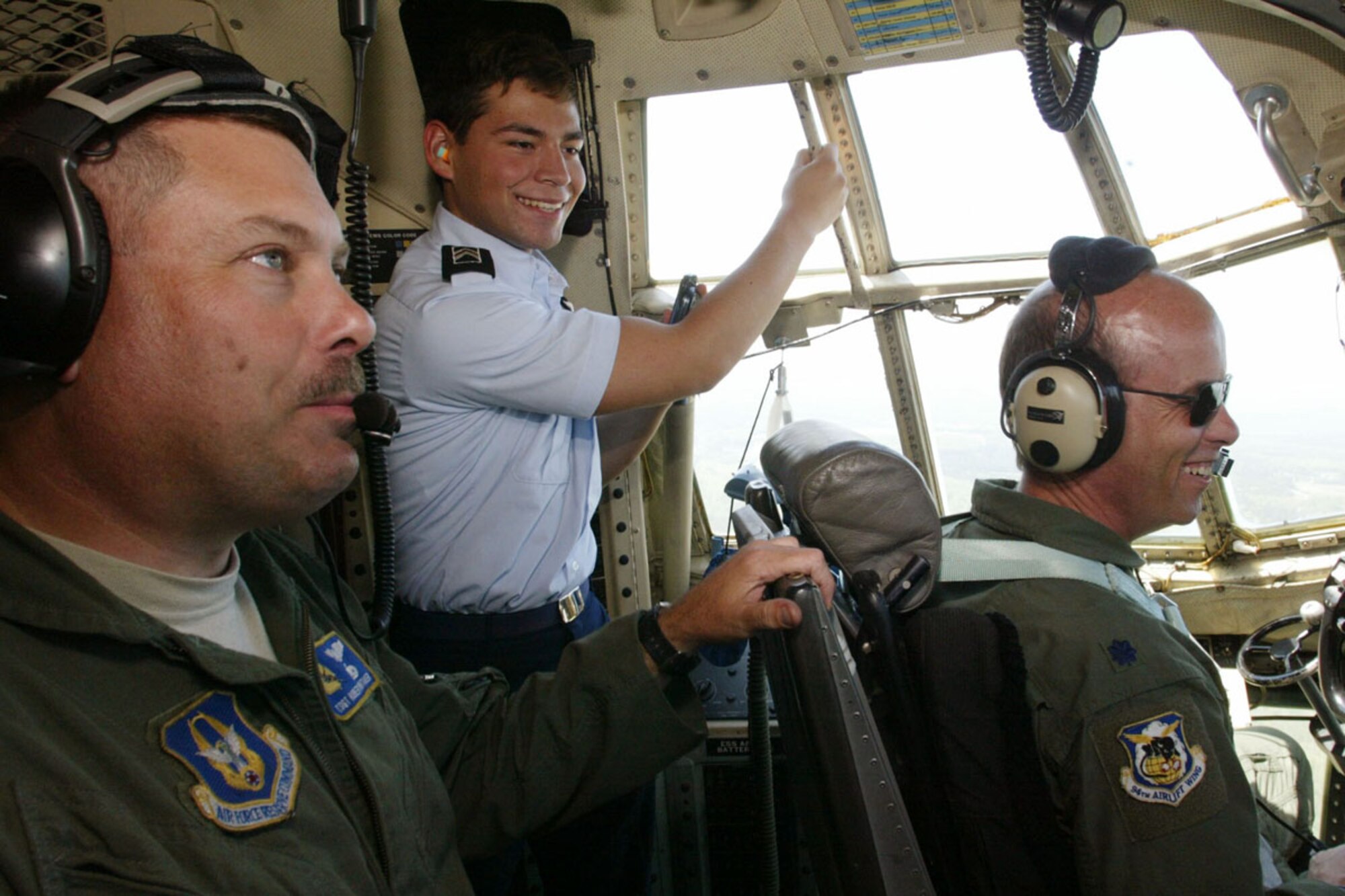 Cadets were allowed to spend a few moments in a C-130 cockpit with the flight crews as during the JROTC orientation flights April 13-14. Orientation flights are designed to introduce youth to general aviation and military opportunities through hands-on interaction with aircraft, equipment and personnel. (U.S. Air Force photo/Don Peek)
