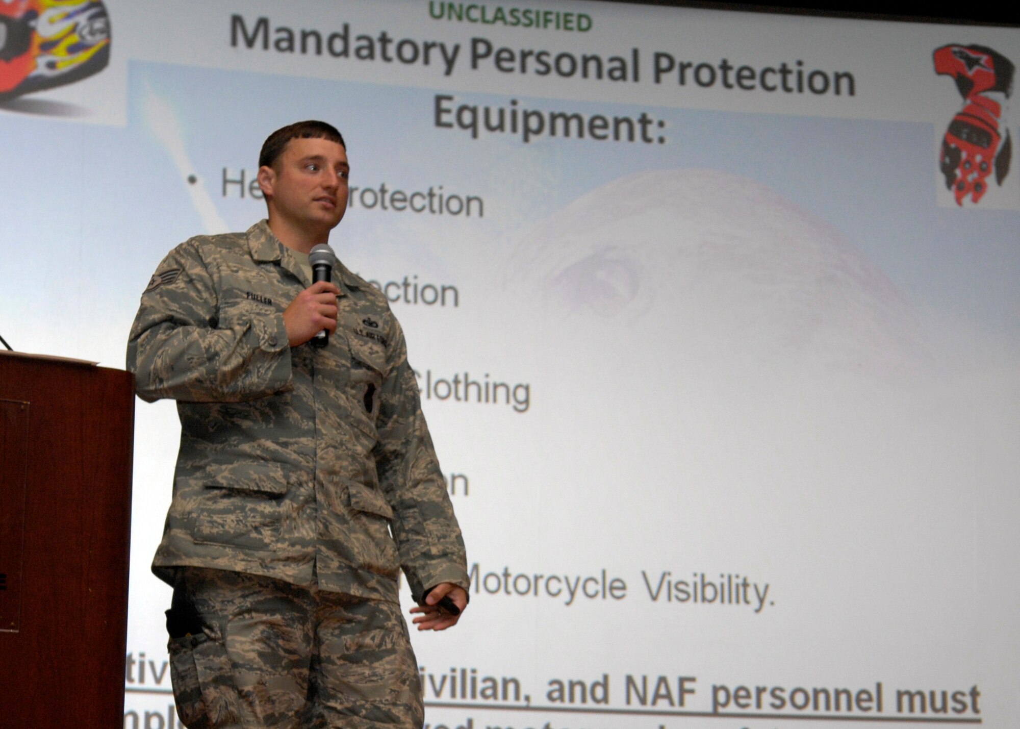 VANDENBERG AIR FORCE BASE, Calif. – Staff Sgt. Timothy Fuller, of the 30th Security Forces Squadron, goes over the personal protective equipment requirements for motorcycle riders at the base theater here Wednesday, April 21, 2010. An assembly was held to inform motorcyclists about safety measures and policies being implemented here. (U.S. Air Force photo/Airman 1st Class Lael Huss)