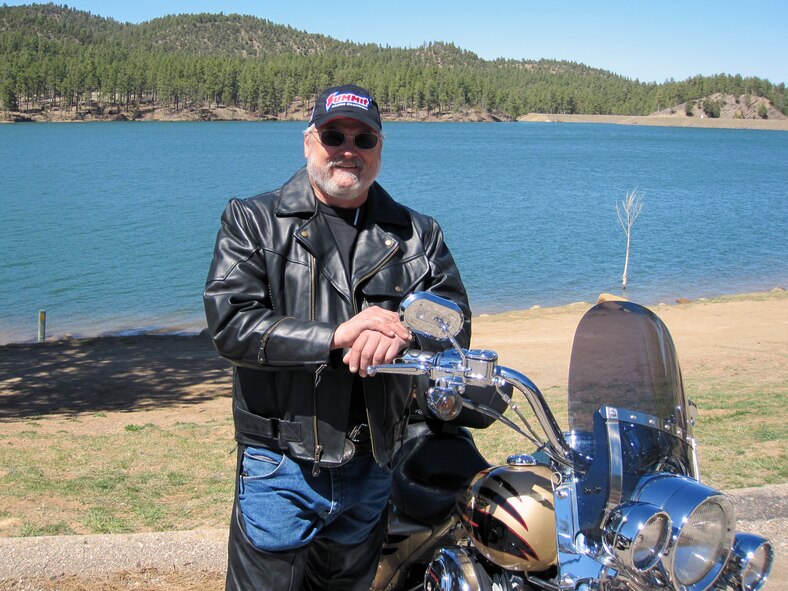 Kirtland AFB motorcycle rally participants took their first ride of the season on a road trip to Ruidoso, N.M. April 10. Above, Scott Wihebrink, Air Force Nuclear Weapons Center, enjoys a break by the lake at Inn of the Mountain Gods. Courtesy Photo