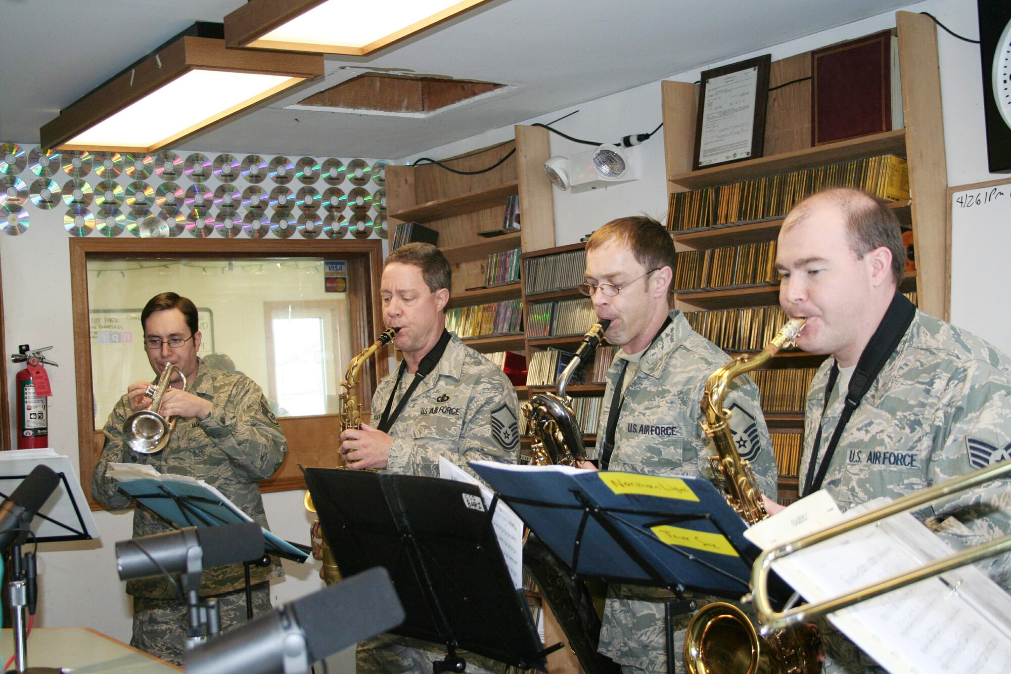 Members of the Pacific Air Forces Northern Lights brass ensemble perform live on a local radio station April 20, 2010, in Kotzebue, Alaska. (Photo by Tech. Sgt. Michelle Colley)