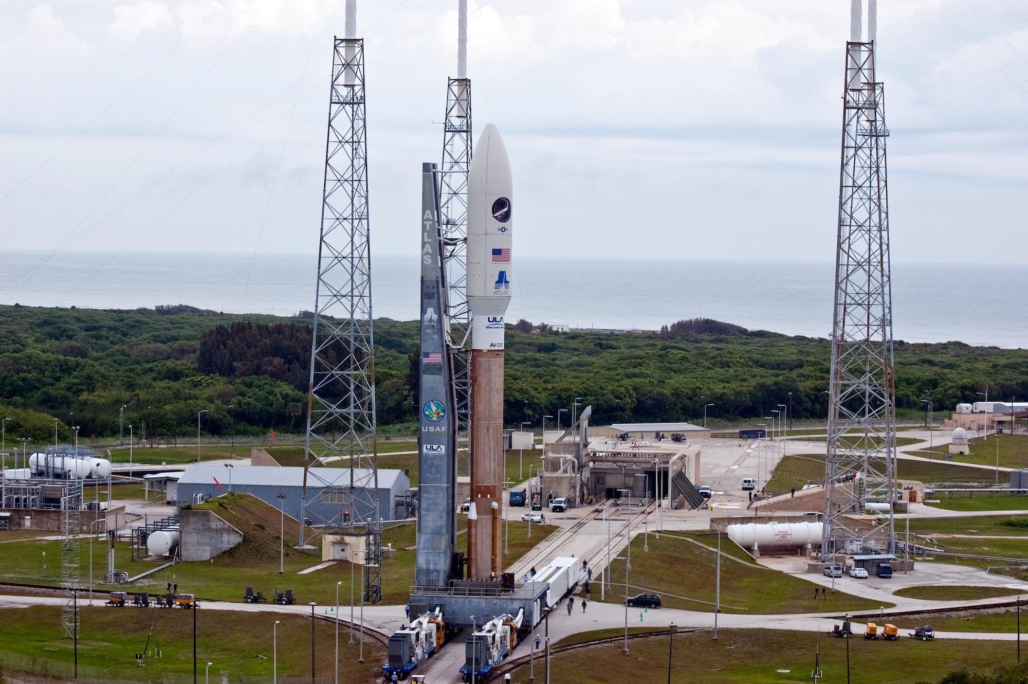 A United Launch Alliance Atlas V rocket with the Air Force’s Orbital Test Vehicle (OTV) rolls out to its Space Launch Complex-41 launch pad April 21. The OTV, also known as the X-37B, supports space experimentation, risk reduction, and concept of operations development for long duration and reusable space vehicle technologies.
(United Launch Alliance photo/Pat Corkery)