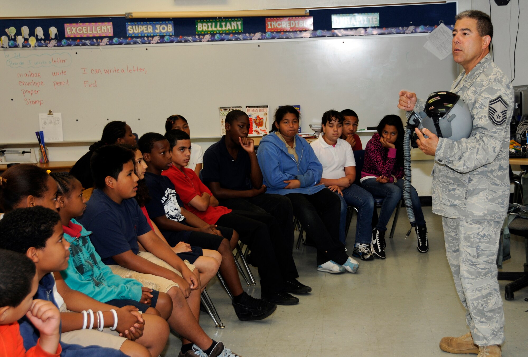 Senior Master Sgt. Tony Romero, Superintendent, Aircrew Flight Equipment, 482nd Operations Group, Homestead Air Reserve Base, Fla., speaks to fifth graders at Irving and Beatrice Peskoe elementary school’s Career Day on April 20. (U.S. Air Force photo/Tim Norton)