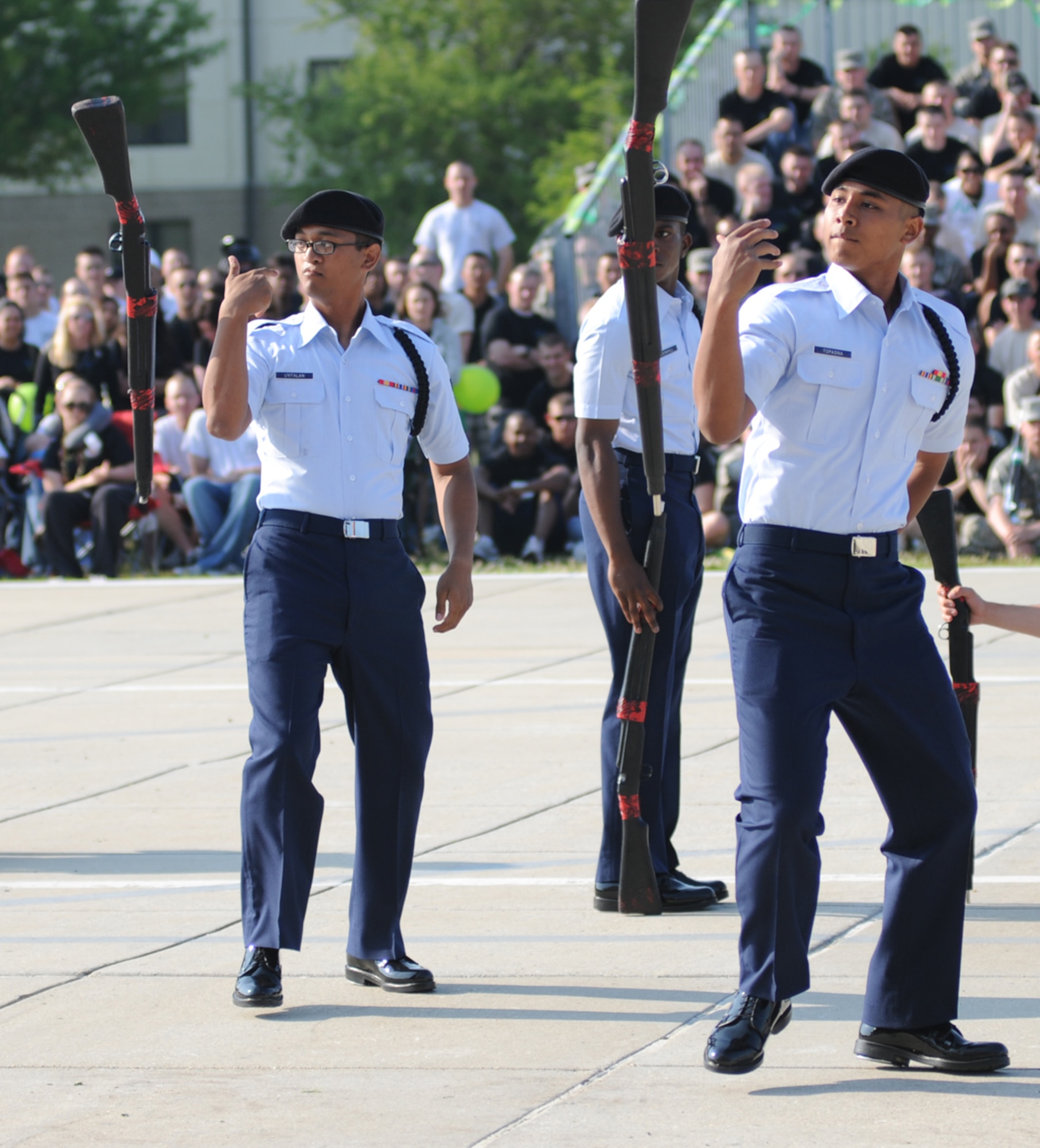 Airmen 1st Class Jeremy Untalan, left, and Kyle Topasna perform with the 338th TRS team during the freestyle competition.  Airman Topasna was the drill master for the freestyle team.  The Dark Knights claimed second place overall.  (U.S. Air Force photo by Kemberly Groue)