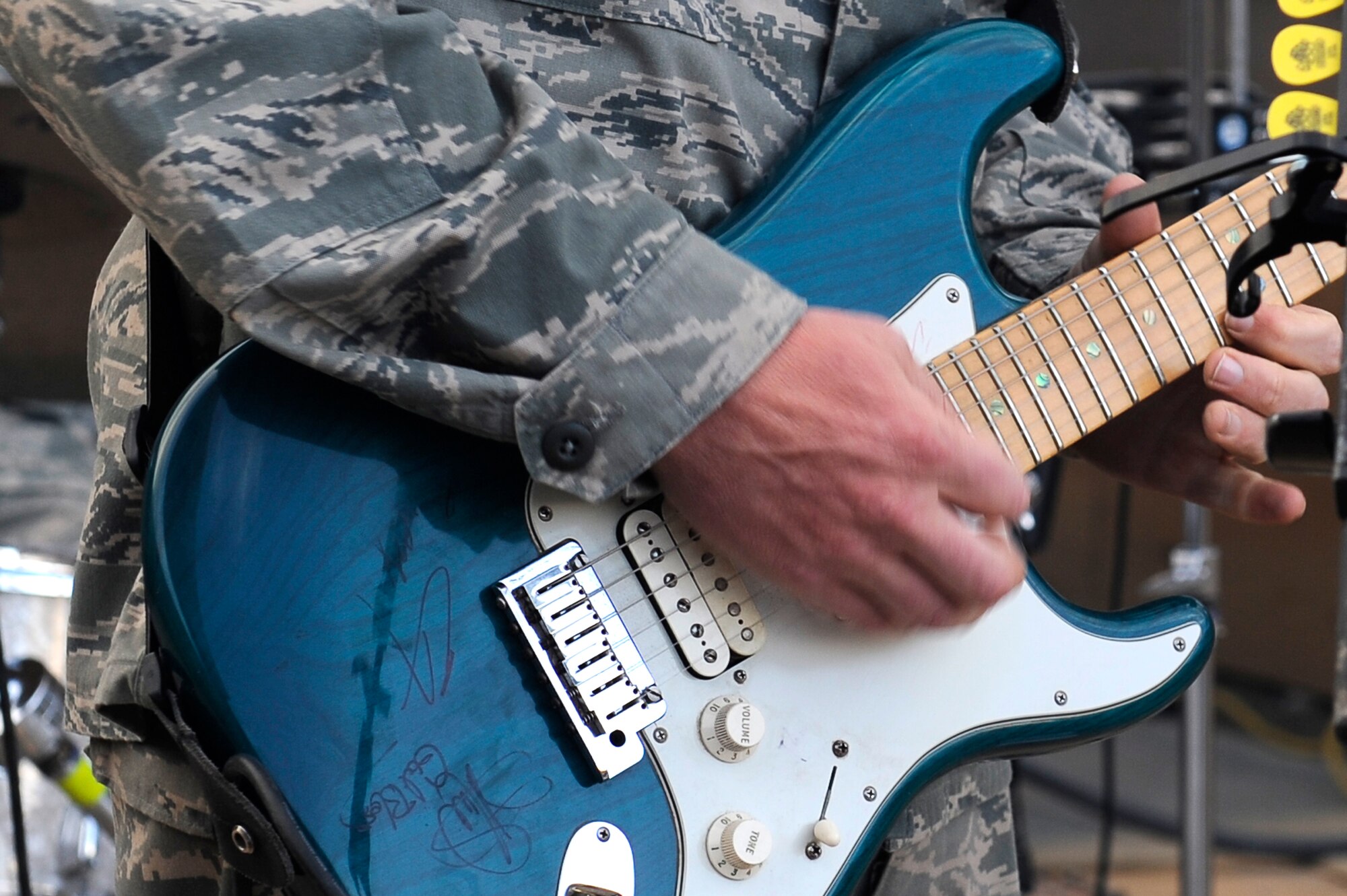 U.S. Air Force Senior Airman Josh Byrd, guitarist for the Air Forces Central Expeditionary Band, Reserve Generation, performs at Bagram Airfield, Afghanistan, April 18, 2010. (U.S. Air Force photo by/ Tech. Sgt. Jeromy K. Cross/released)







