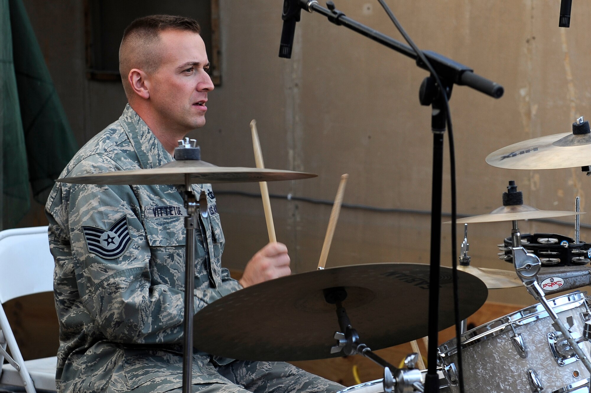 U.S. Air Force Tech. Sgt. David Vittetoe, drummer for the Air Forces Central Expeditionary Band, Reserve Generation, performs at Bagram Airfield, Afghanistan, April 18, 2010. (U.S. Air Force photo by/ Tech. Sgt. Jeromy K. Cross/released)








