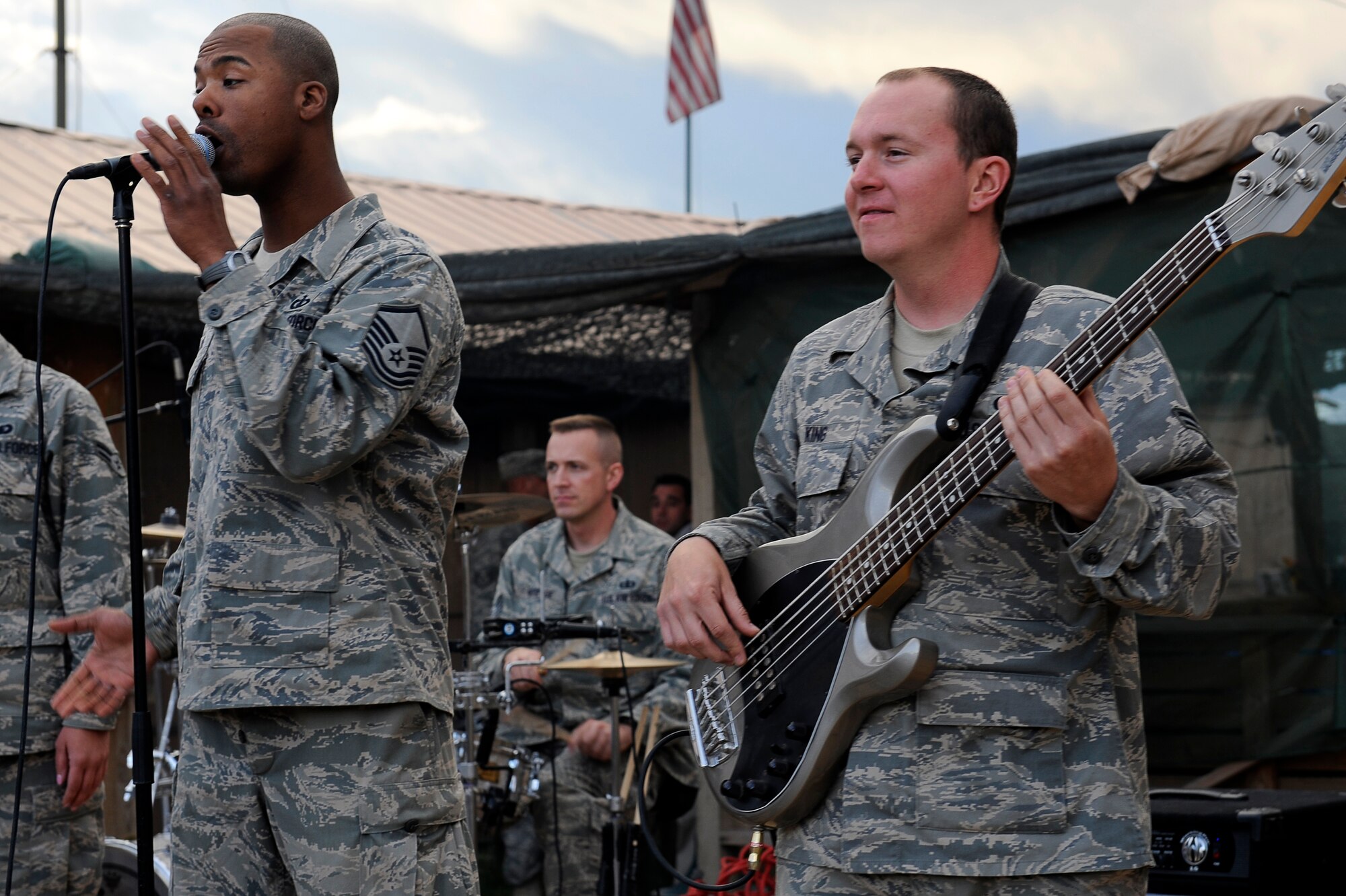 U.S. Air Force Master Sgt. Aaron Miles, Airman 1st Class Darren King (left to right), and Tech. Sgt. David Vittetoe (back), members of the Air Forces Central Expeditionary Band, Reserve Generation, perform at Bagram Airfield, Afghanistan, April 18, 2010. (U.S. Air Force photo by/ Tech. Sgt. Jeromy K. Cross/released)








