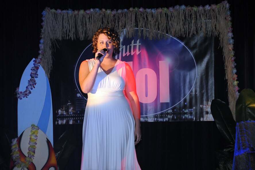 OFFUTT AIR FORCE BASE, Neb. -- Chelsea Little, performs "I Love You I Do" during the finals of the Offutt Idol competition at the Patriot Club here April 16. Ms. Little, who took second place in the competition, said she enjoys singing in church. U.S. Air Force photo by Kendra Williams.