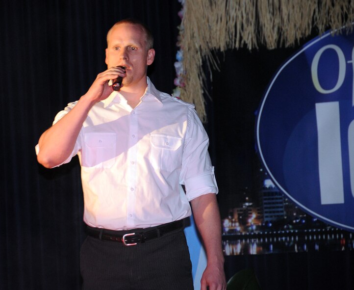 OFFUTT AIR FORCE BASE, Neb. -- Joshua Carvell, U.S. Strategic Command, performs at the Patriot Club here April 16 during the finals of the Offutt Idol competition. Mr. Carvell won the competition and the grand prize of $1,000. U.S. Air Force photo by Kendra Williams