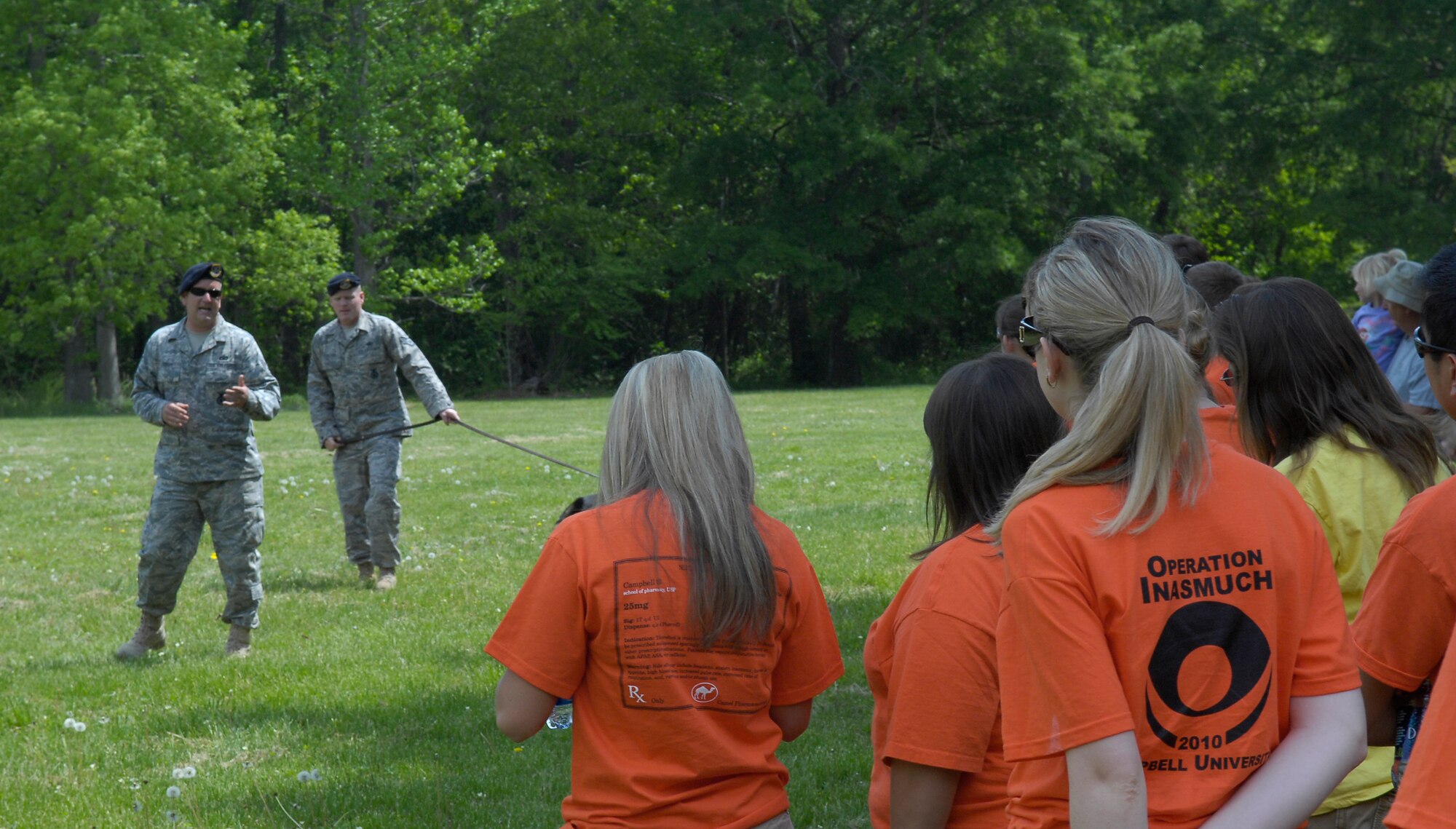 Members from the 43rd Security Forces Squadron perform a military working dogs demonstration for the citizens of Erwin, N.C. during an Earth Day Celebration in Erwin, April 17. Earth Day is an annual event, which promotes the sustainment of the Earth’s environment. (U.S. Air Force Photo/Vicki Johnson) 