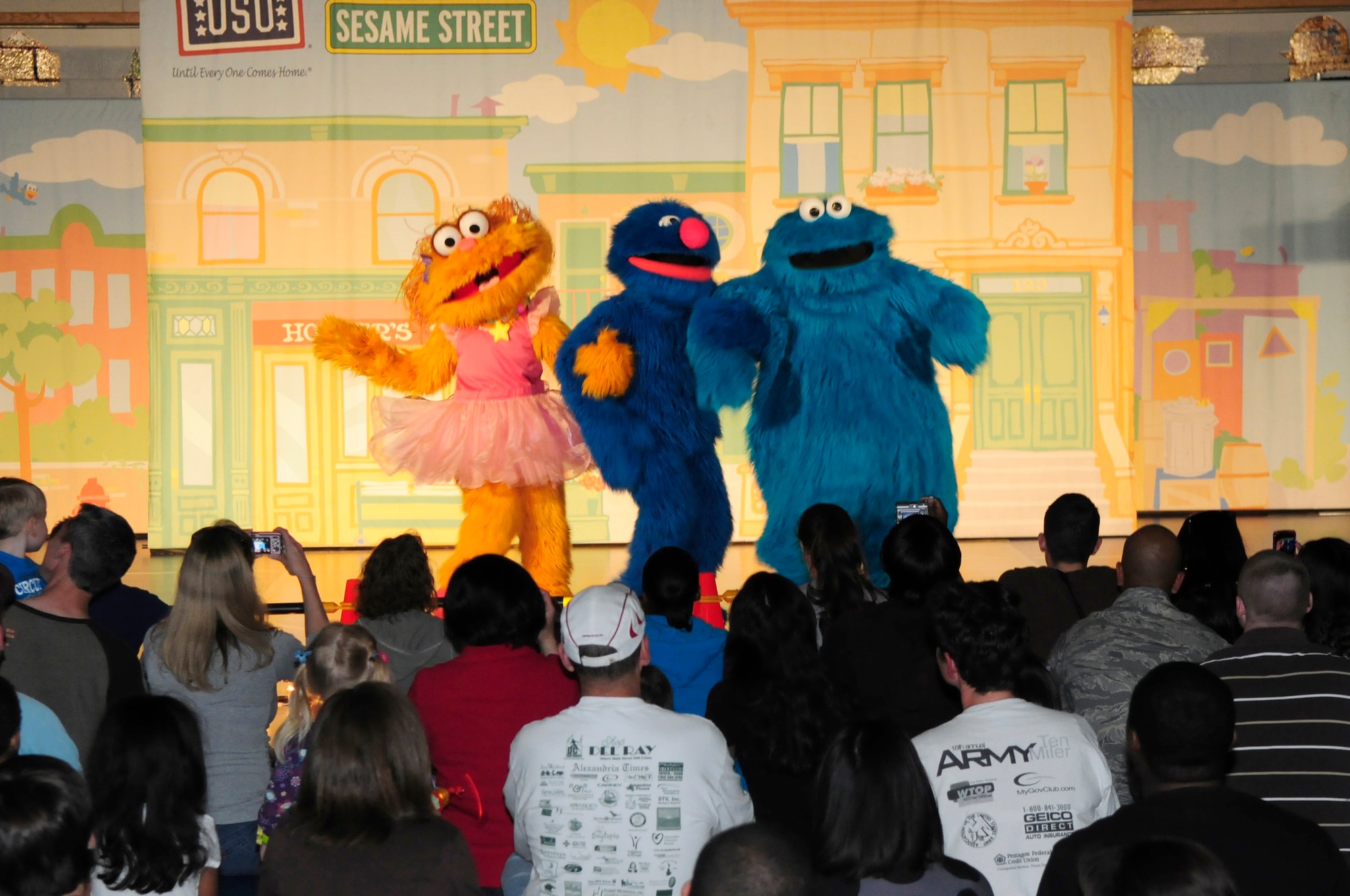 Sesame Street characters perform live April 21 at the Bolling Youth Center. The production was a USO-sponsored event is an outreach program focused on talking, listening and connecting for military families and their children. (U.S. Air Force photo by Staff Sgt. Raymond Mills)