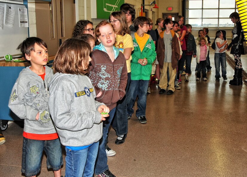 As part of Take your Child to Work Day, children of the 914th and 107th Airlift Wings are given a tour of the Niagara Falls Air Reserve Station April 16, 2010 Niagara Falls Air Reserve Station, Niagara Falls NY. This tour gave the children an understanding of what their parents do during a typical work day. (U.S. Air Force photo by Staff Sgt. Joseph McKee)