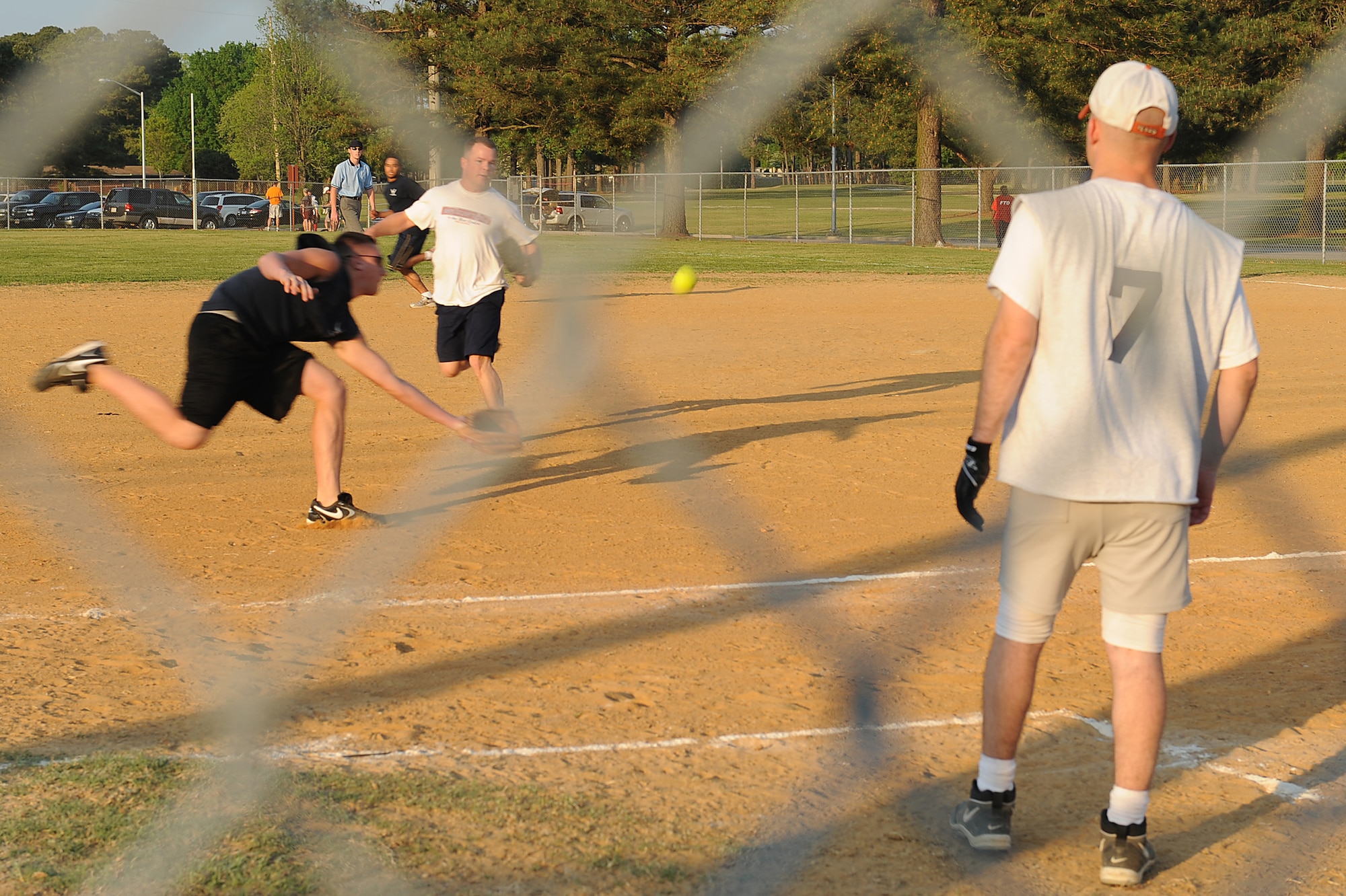 SEYMOUR JOHNSON AIR FORCE BASE, N.C. -- John Thoms sprints to catch a softball during an intramural softball game here, April 13, 2010. Thoms is a right fielder on the 4th Equipment Maintenance Squadron team and is a Boston native.  (U.S. Air Force photo/Senior Airman Whitney Lambert)