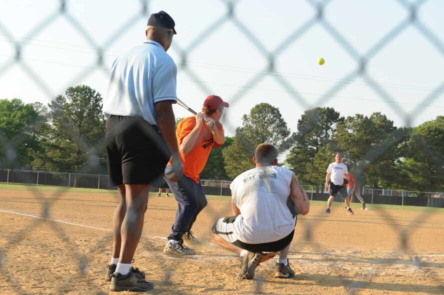 SEYMOUR JOHNSON AIR FORCE BASE, N.C. -- Jimi Wunders prepares to swing during the base's opening season intramural softball game here, April 13, 2010. Mr. Wunders is the 4th Medical Group team pitcher and hails from Middletown, N.Y. (U.S. Air Force photo/Senior Airman Whitney Lambert)