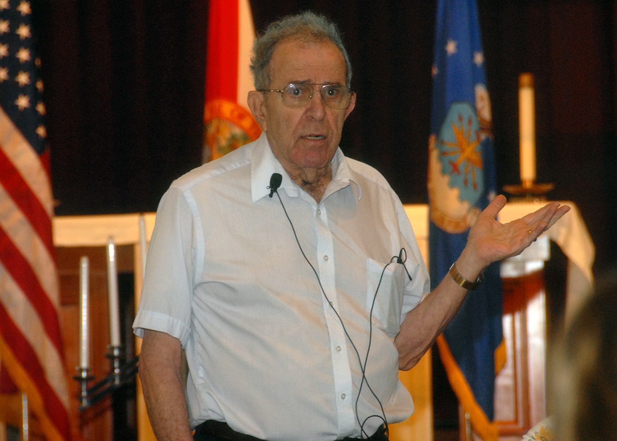Dr. Victor Sapio tells the crowd about his time spent in a Nazi concentration camp as a young boy during the Day of Remembrance observance at Eglin Air Force Base, Fla., April 20.  The event took place three weeks prior to the 65th anniversary of the end of World War II in Europe.  Doctor Sapio eventually moved to America where he learned to speak English and became a professor.  (U.S. Air Force photo/Samuel King Jr.) 
