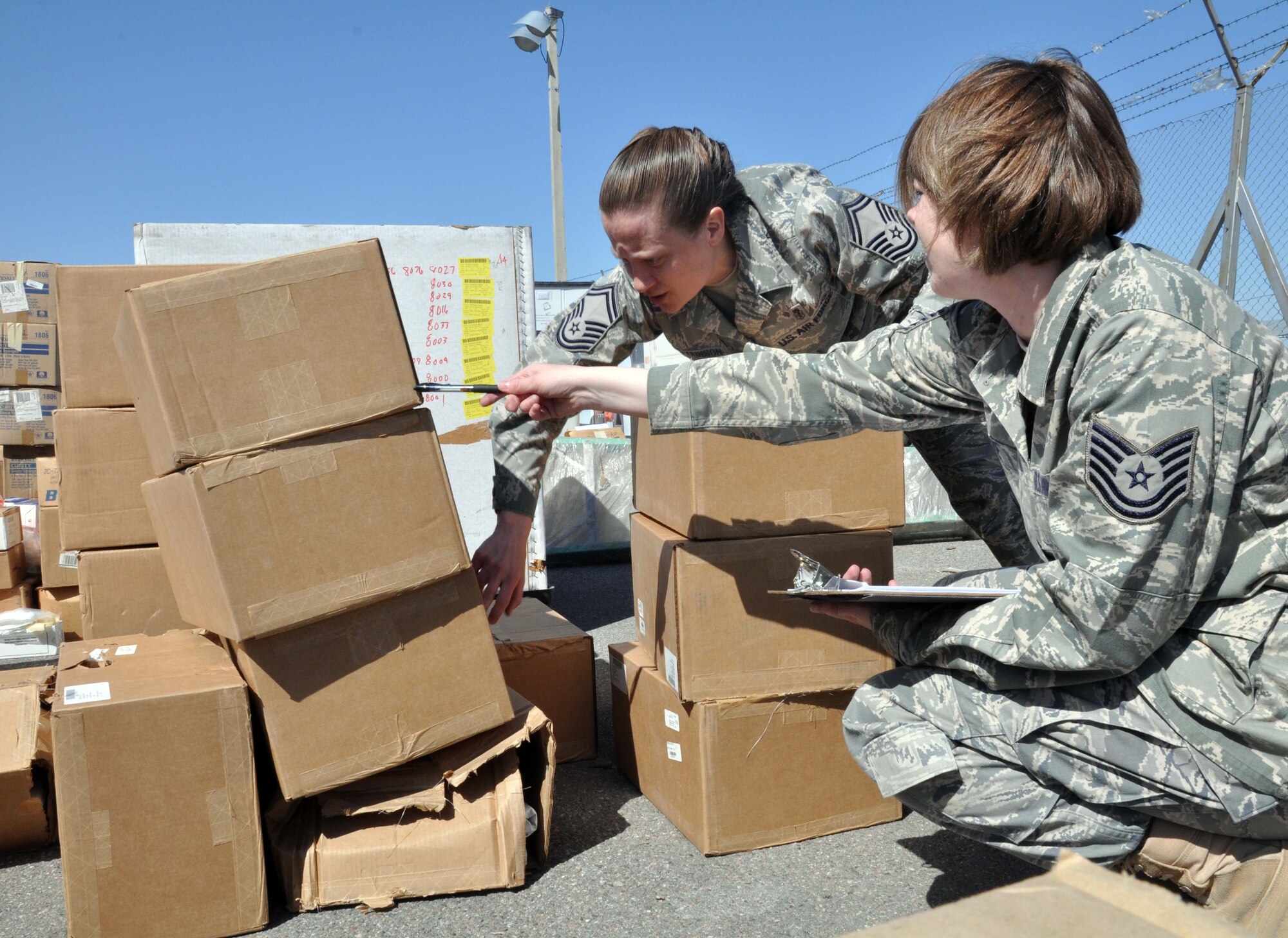 Airmen from the 376th Expeditionary Medical Group at the Transit Center at
Manas, Kyrgyzstan, sort and inventory medical supplies for future distribution to
hospitals in Bishkek. Since April 7, the Transit Center has donated approximately $300,000 worth of medical supplies. Humanitarian assistance is one of the four main mission sets of the Transit Center. (U.S.Air Force photo/Staff Sgt. Carolyn Viss)
