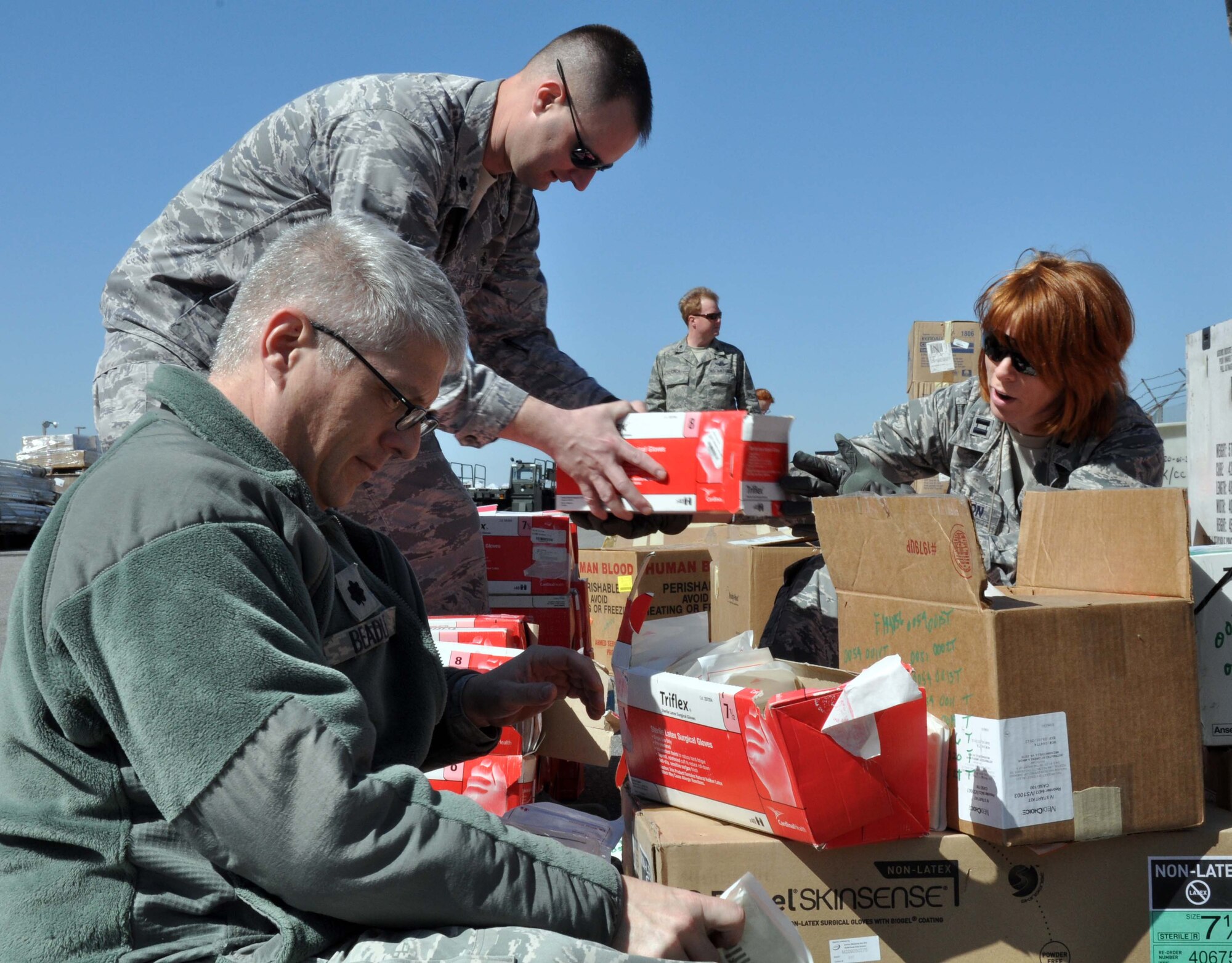 Airmen from the 376th Expeditionary Medical Group at the Transit Center at
Manas, Kyrgyzstan, sort and inventory medical supplies for future distribution to
hospitals in Bishkek. Since April 7, the Transit Center has donated approximately $300,000 worth of medical supplies. Humanitarian assistance is one of the four main mission sets of the Transit Center. (U.S.Air Force photo/Staff Sgt. Carolyn Viss)
