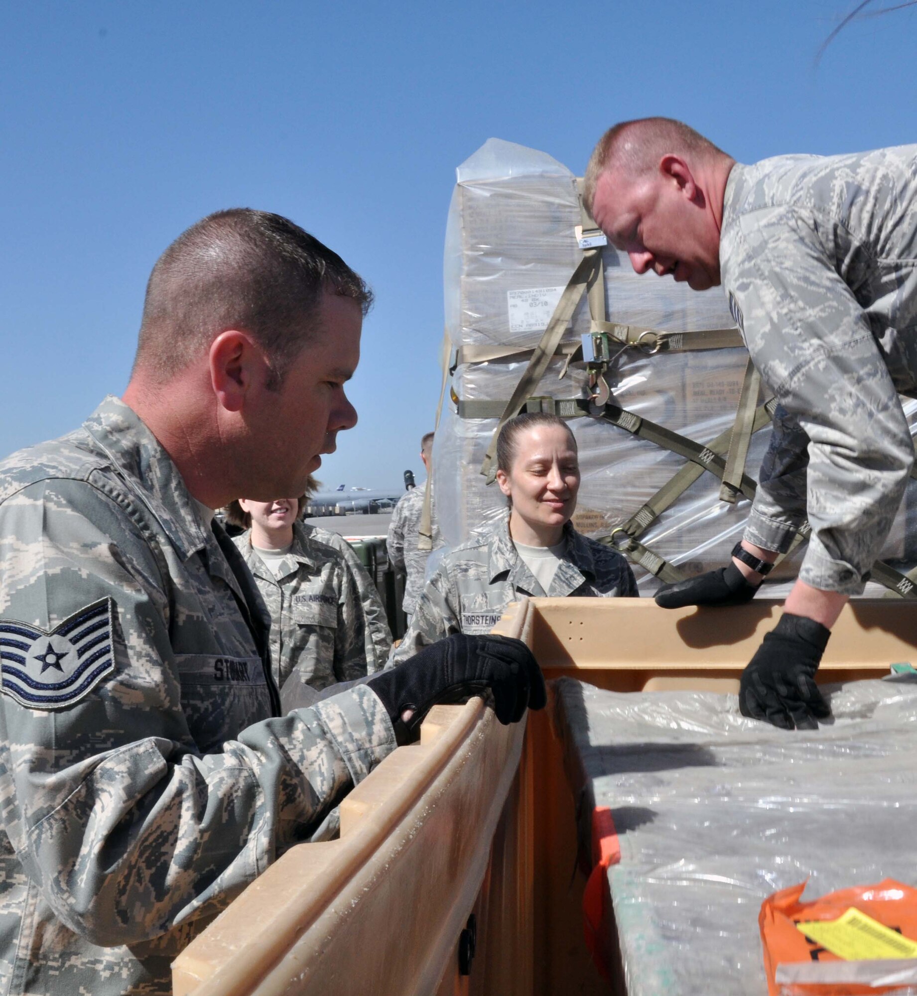Airmen from the 376th Expeditionary Medical Group at the Transit Center at
Manas, Kyrgyzstan, sort and inventory medical supplies for future distribution to
hospitals in Bishkek. Since April 7, the Transit Center has donated approximately $300,000 worth of medical supplies. Humanitarian assistance is one of the four main mission sets of the Transit Center. (U.S.Air Force photo/Staff Sgt. Carolyn Viss)
