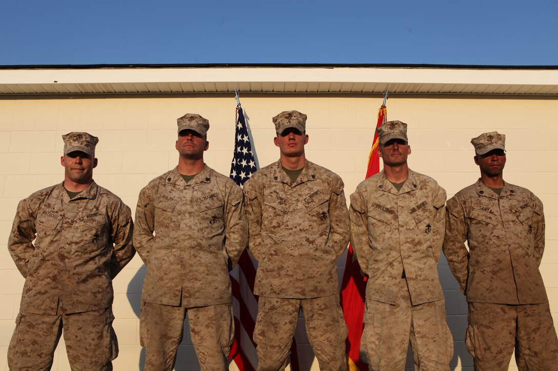 (from left to right) Sgt. Jason Watrous, Sgt. Alvah Childs III, Sgt. Daniel Toner, Sgt. Daniel Oglesby and Staff Sgt. Ismael Santa III, combat instructors with Company F, Marine Combat Training Battalion, School of Infantry-East, stand proudly after winning the MCT Battalion Combat Instructor Competition aboard Camp Geiger, N.C., April 22.  Five companies chose their top five combat instructors to compete in the two-day event that tested common skills and gave the winning company bragging rights within the spirit of competition.