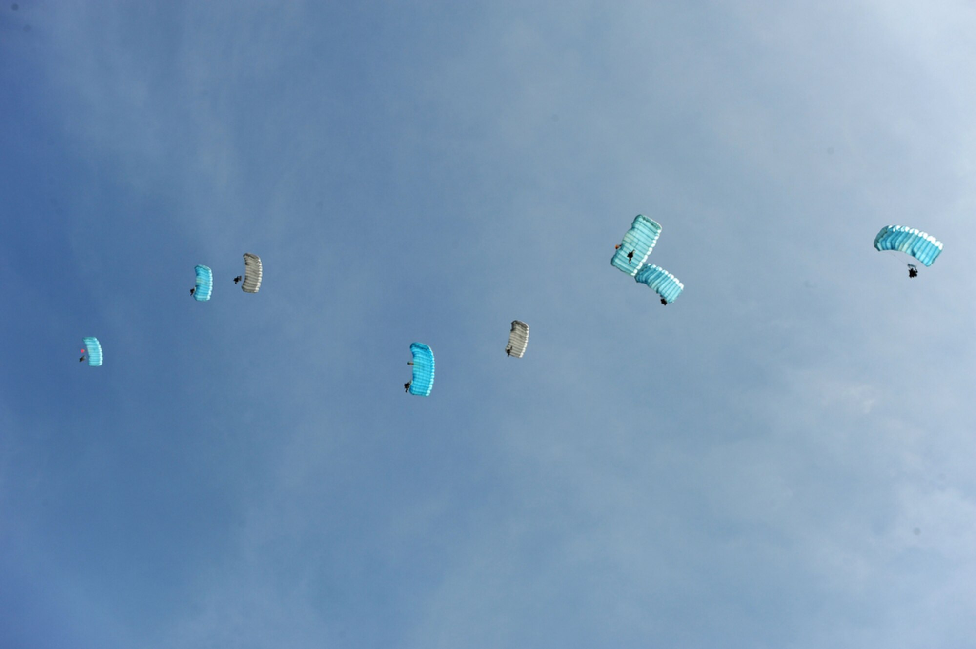 Indonesian soldiers jump from a U.S. Air Force C-130 Hercules assigned to 36th Airlift Squadron at Yokota Air Base, Japan, during exercise Cope West 10 in Indonesia, April 21, 2010. Cope West is a Pacific Air Forces-sponsored bilateral tactical airlift exercise involving U.S. and Indonesian air forces. The exercise is designed to advance interoperability between U.S. and Indonesian air forces, and promote cooperation and unity of purpose.  (U.S.  Air Force photo/Tech Sgt. Cohen A. Young)