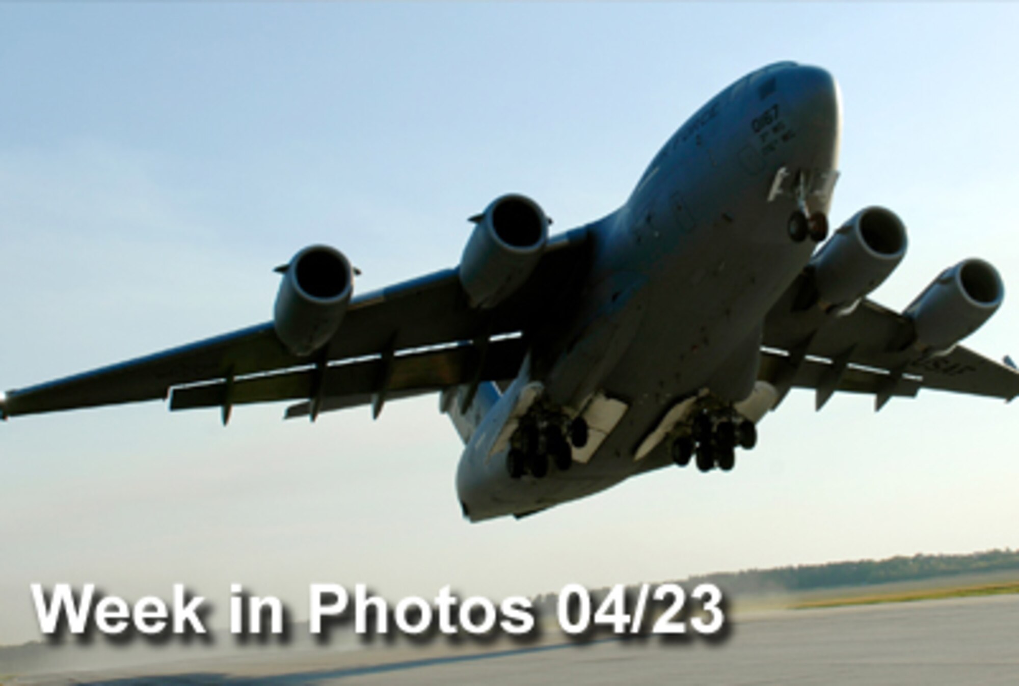 Air Force Week in Photos for April 23, 2010, highlights photos from around the Air Force. In this photo by Staff Sgt. Brian Ferguson, a C-17 Globemaster III takes off April 15, 2010, from Fort Pickett Maneuver Training Center, Va. (U.S. Air Force photo illustration)