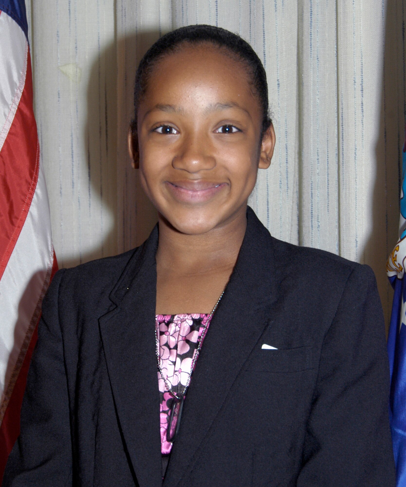 Diamond Nicholson was one of 35 children who attended the Take Our Daughters and Sons to Work Day at the Air Reserve Personnel Center on April 22. During the event, children were asked what were the three most important things they can do to prepare for their future. "Keep doing your best; always try your hardest; and keep getting your education," Diamond said. (U.S. Air Force photo/Mike Molina)                                