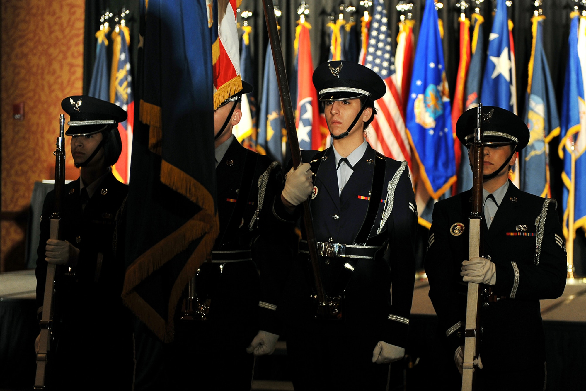 OFFUTT AIR FORCE BASE, Neb. -- Honor Guard members from various bases across Air Combat Command post the colors during ACC's Outstanding Airmen of the Year banquet at the Embassy Suites hotel in La Vista, Neb., April 21. More than 200 people attended the ceremony to honor the command's best Airmen for their dedication, sacrifice and service. U.S. Air Force photo by Charles Haymond