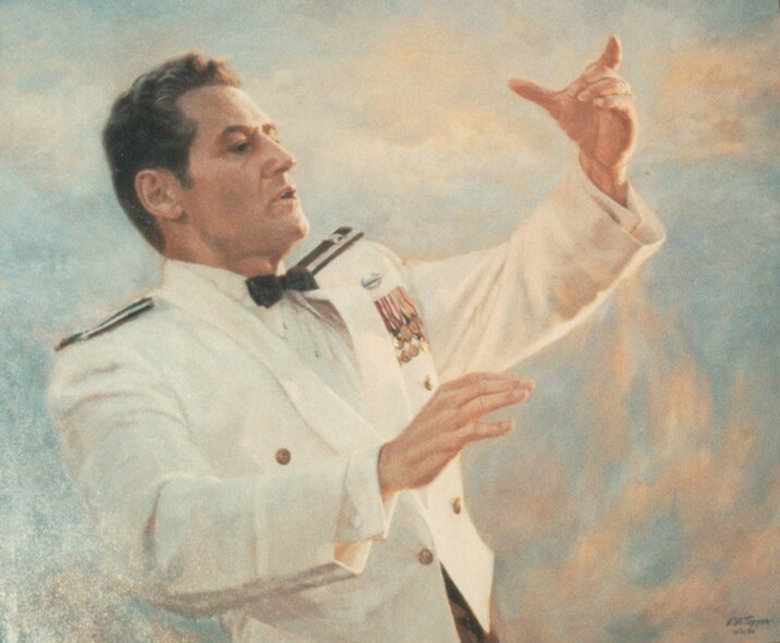 This portrait of Col. Arnald Gabriel conducting the U.S. Air Force Band was presented to Colonel Gabriel during his retirement ceremony, Feb. 21 1985. The portrait is in honor of Colonel and Mrs. Gabriel upon the occasion of his retirement from the United States Air Force after 36 years of service.  
Col. Gabriel is now conductor emeritus of the U.S. Air Force Band. In April, 2010, the colonel conducted The U.S. Air Force Band Strings as they recorded a holiday album. 