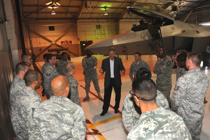 Nellis Air Force Base, Nev-Chief Master Sgt. of the Air Force (Ret) Gerald Murray talks with Airman from the 57th maintenance squadron. Murray is 14th Chief Master Sgt. of the Air Force and the guest speaker at the 57th Wing Maintenance Professional of the Year Banquet. (U.S. Air Force photo by Senior Airman Brian Ybarbo/RELEASED) 