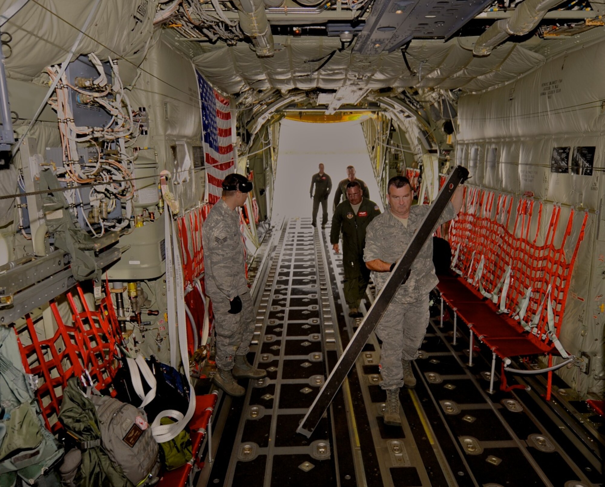 Airmen from the 815th Airlift Squadron prepare a C-130J Super Hercules for a joint services training mission with Army special forces April 12, 2010, in Key West, Fla. (U.S. Air Force photo/Tech. Sgt. Tanya King)