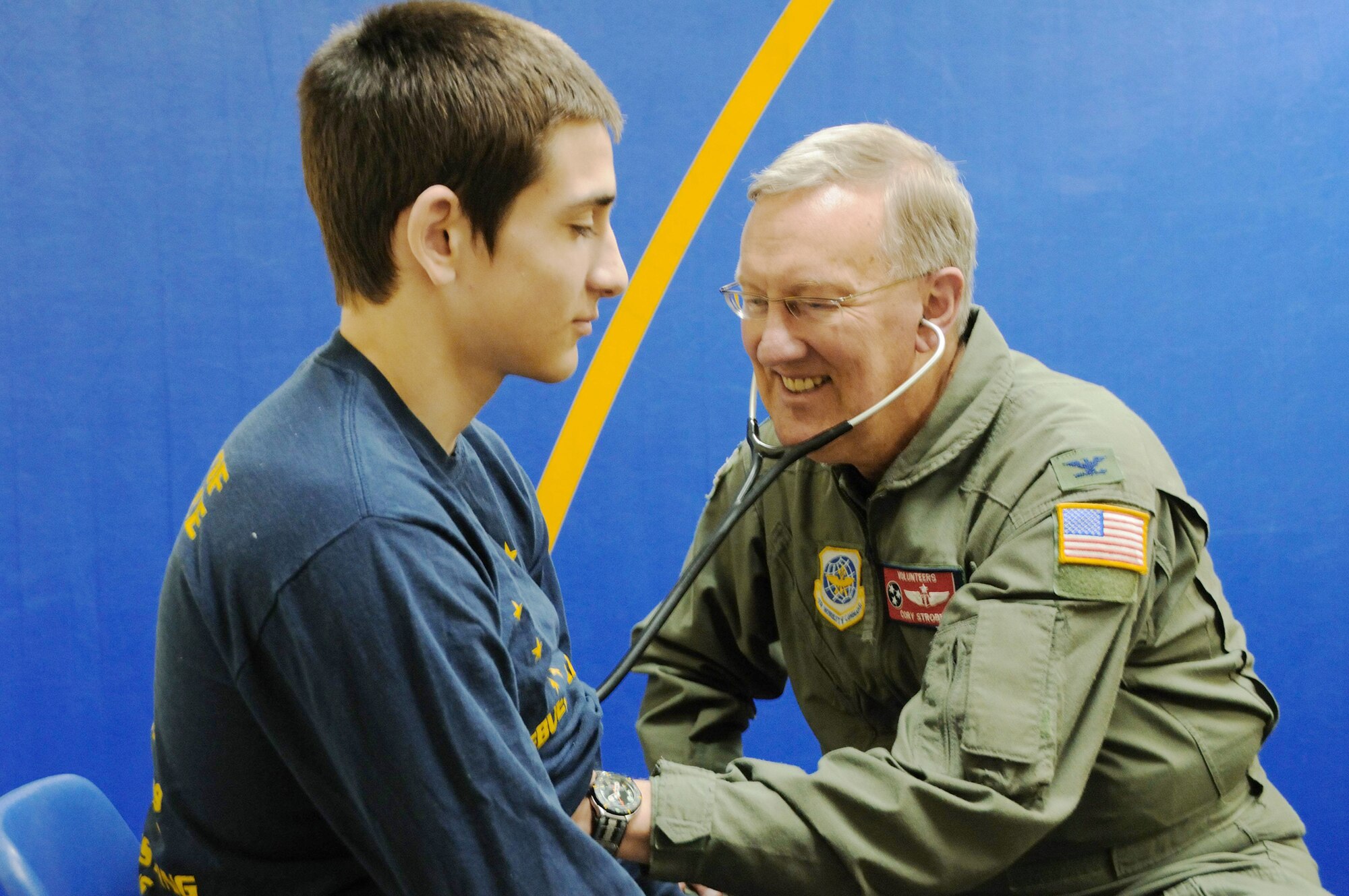Col. Cory Strobel conducts a physical April 18, 2010, on Alaskan native Matthew Rae, a 17-year-old Maniilaq High School student in order to medically clear him to play sports in Kotzebue, Alaska. The medical service is part of Operation Artic Care 2010. Colonel Strobel is the chief of aero medical services, for the 134th Medical Group, at McGhee Tyson Air National Guard Base, Tenn. (U.S. Air Force photo/Technical Sgt. Melissa E. Chatham)
