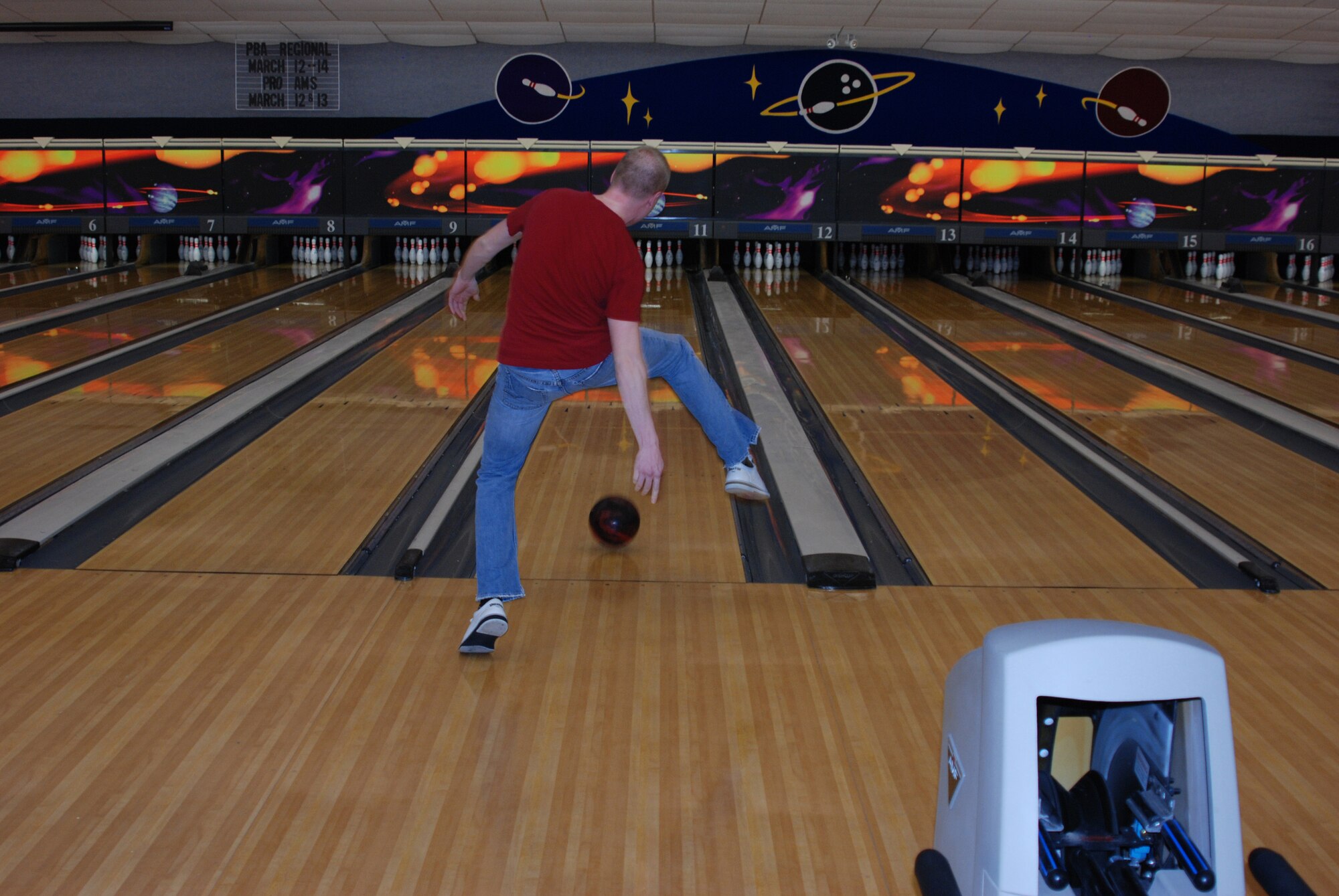 The 932nd Airlift Wing's Rising 6 organization held its annual bowling tournament, and for the second year in a row, it sold out. This trick shot was peformed with ease by Denny Ernsting.  The Rising 6 raised nearly $500. In addition to raffle drawings, food and fun, winning teams and individuals received trophies. The winning team was Team Art Bags, which consisted of Clifford
Waller, Jeffrey Craig, Nick Mead, Aaron Joyce, and Shannon Cook.  (U.S. Air Force photo/Tech. Sgt. Gerald Sonnenberg)