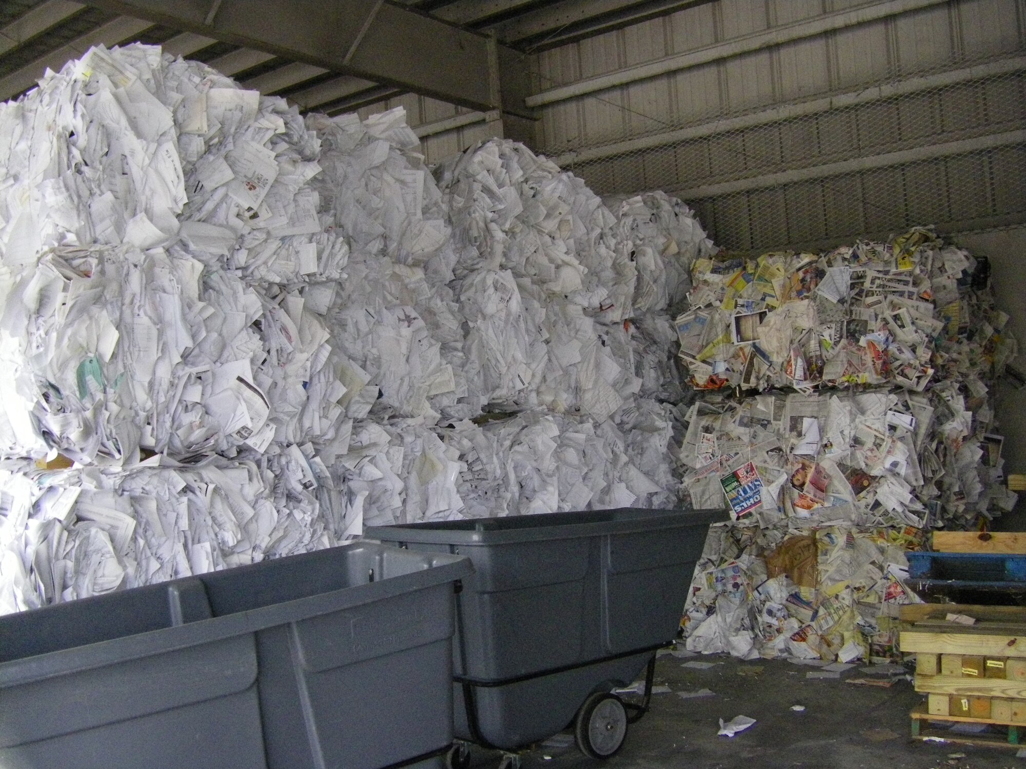 Dozens of bales of office and mixed paper are collected in this file photo from the Hurlburt Field recycle center. The base recycled more than 160,000 pounds of metals, papers, glass and plastics during the first two quarters of fiscal year 2010. (Courtesy photo)